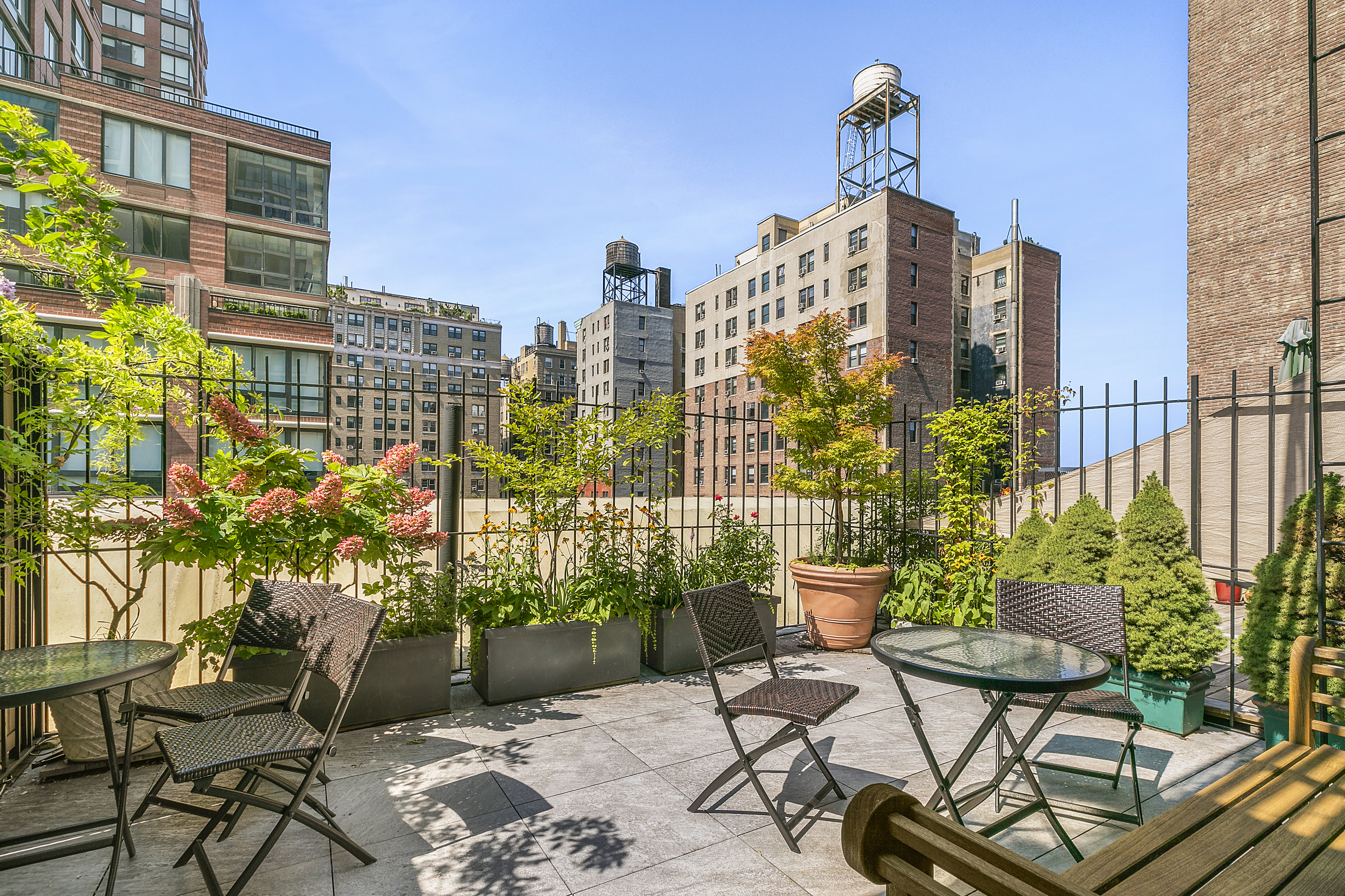 255 West 95th Street, Unit 1B Manhattan, NY 10025 - Photo 9 of 12 a view of a terrace with chairs and potted plants