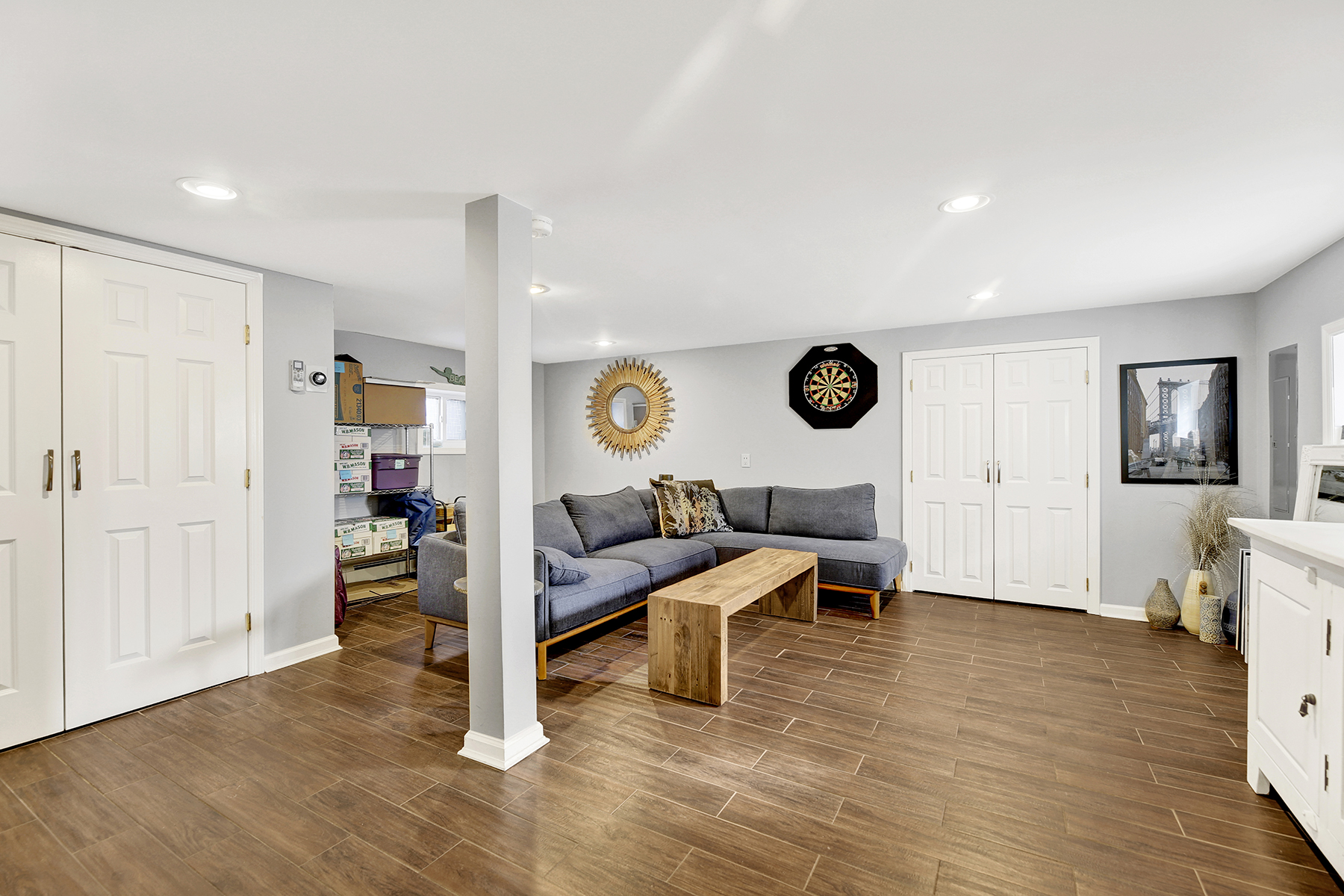 4-53 Beach 142nd Street Queens, NY 11694 - Photo 28 of 39 a living room with furniture and a wooden floor