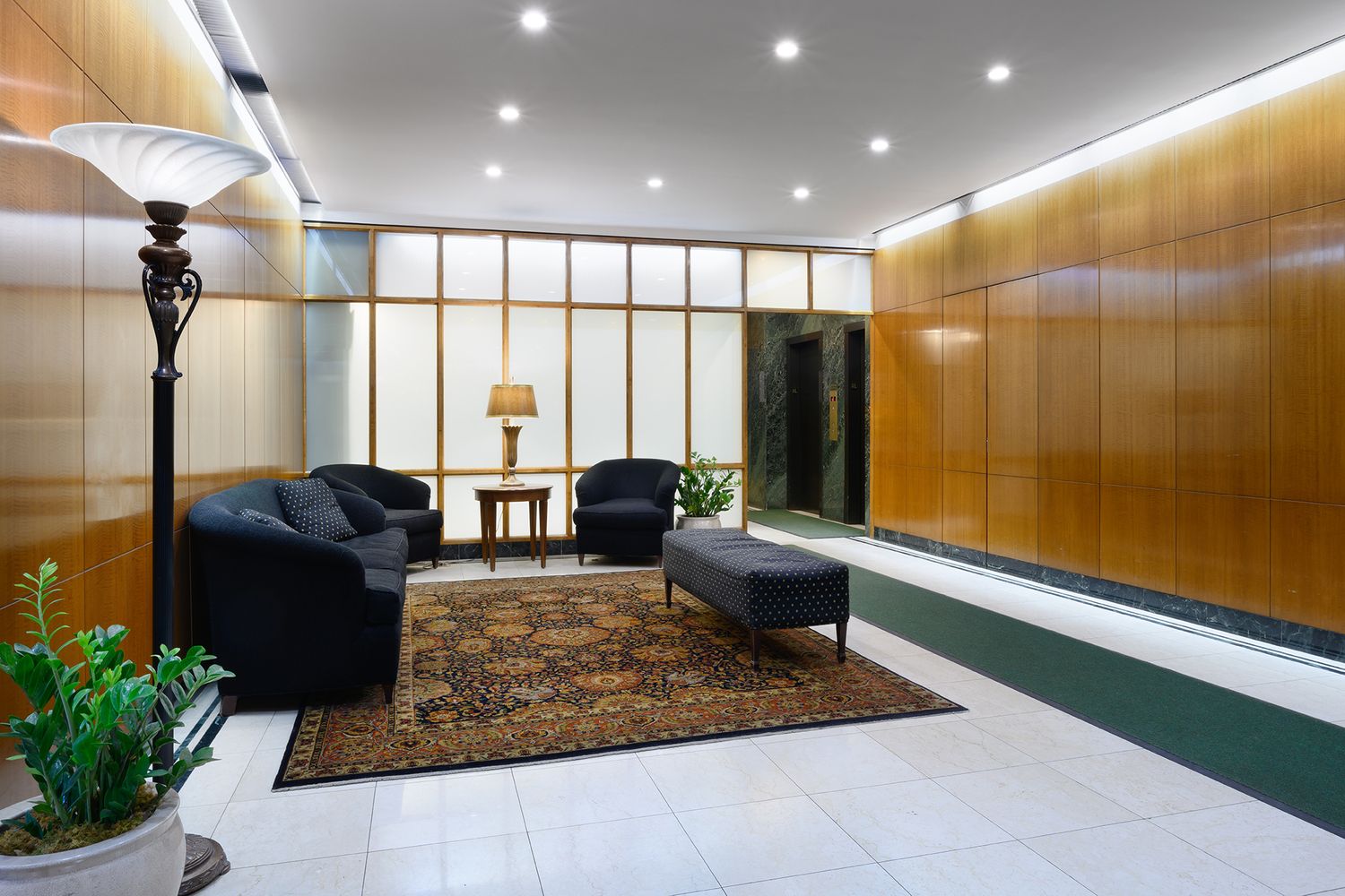 411 East 53rd Street, Unit 11K Manhattan, NY 10022 - Photo 13 of 19 a living room with furniture and a large window