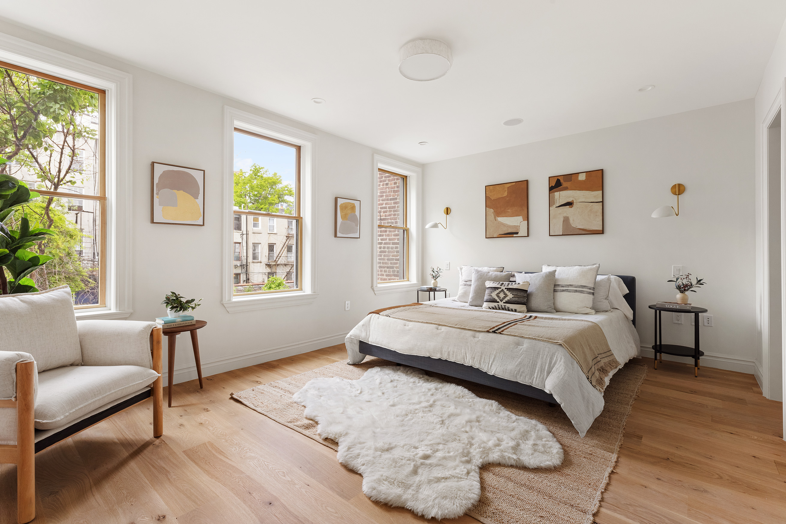 363 Warren Street Brooklyn, NY 11201 - Photo 10 of 23 a bedroom with a bed couch and a window