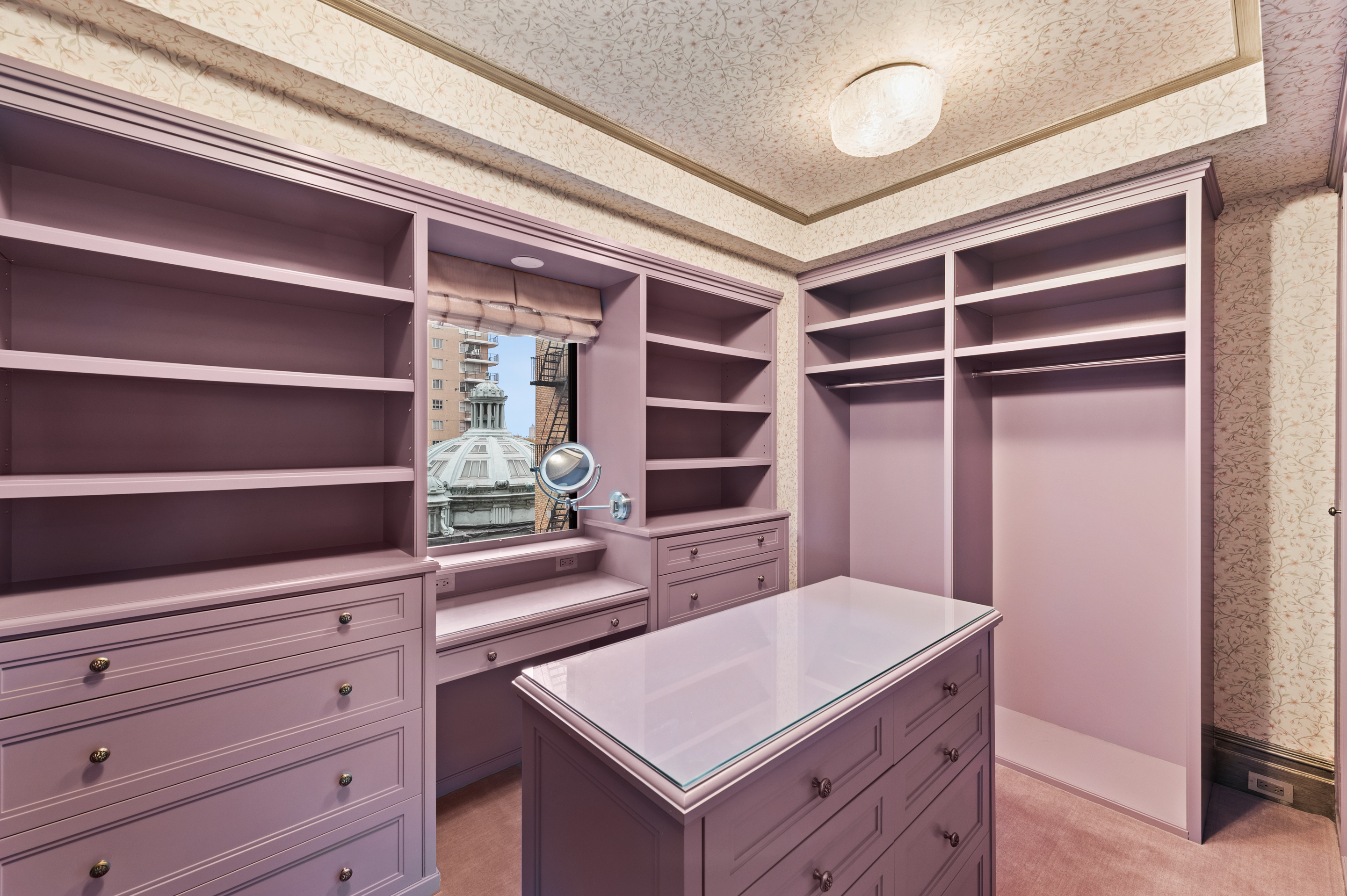 1 West 67th Street, Unit 616/6E Manhattan, NY 10023 - Photo 17 of 27 a view of an empty walk in closet