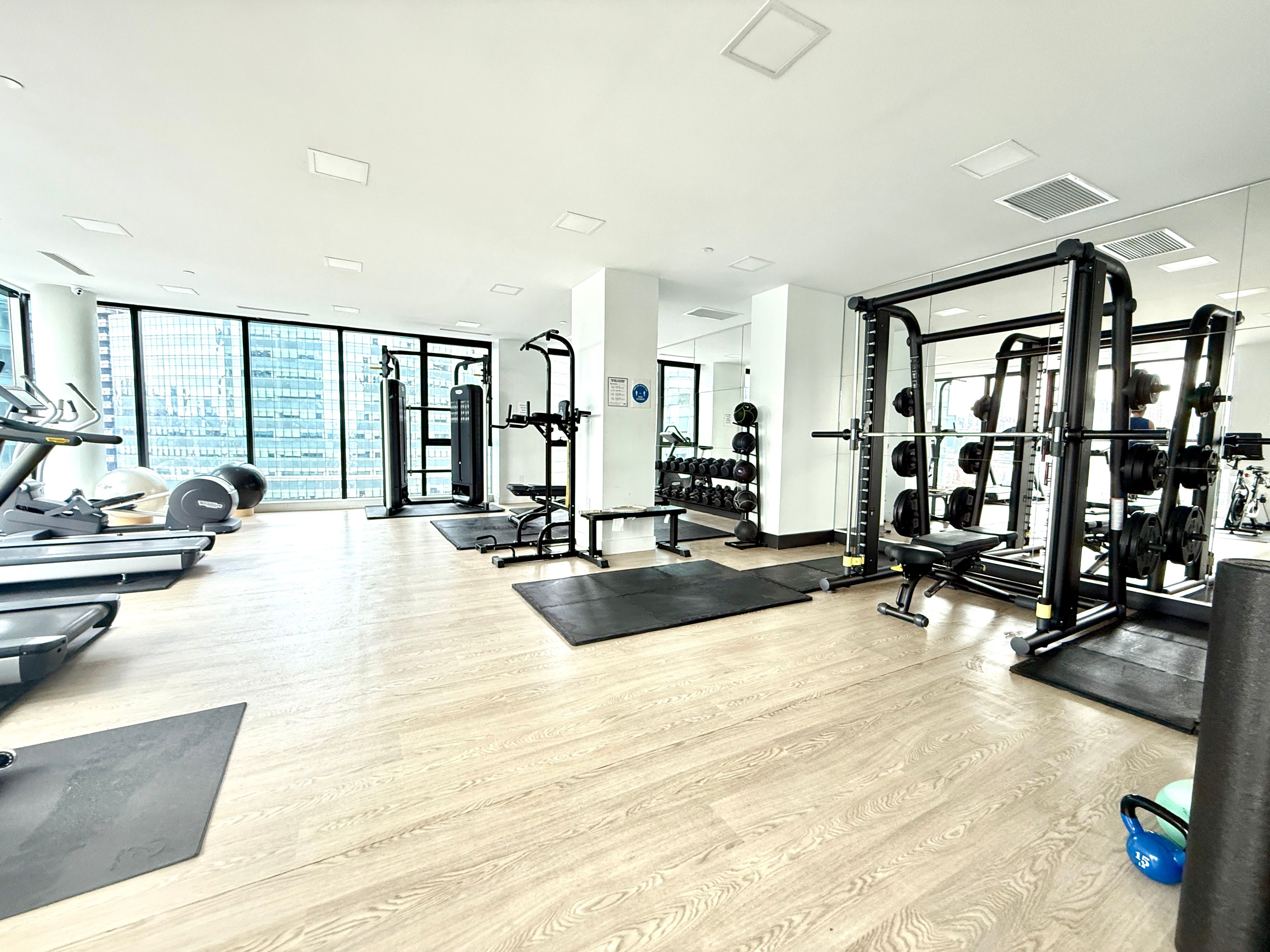 4507 Court Square, Unit 8D Queens, NY 11101 - Photo 17 of 28 a view of a living room kitchen floor and a floor to ceiling window