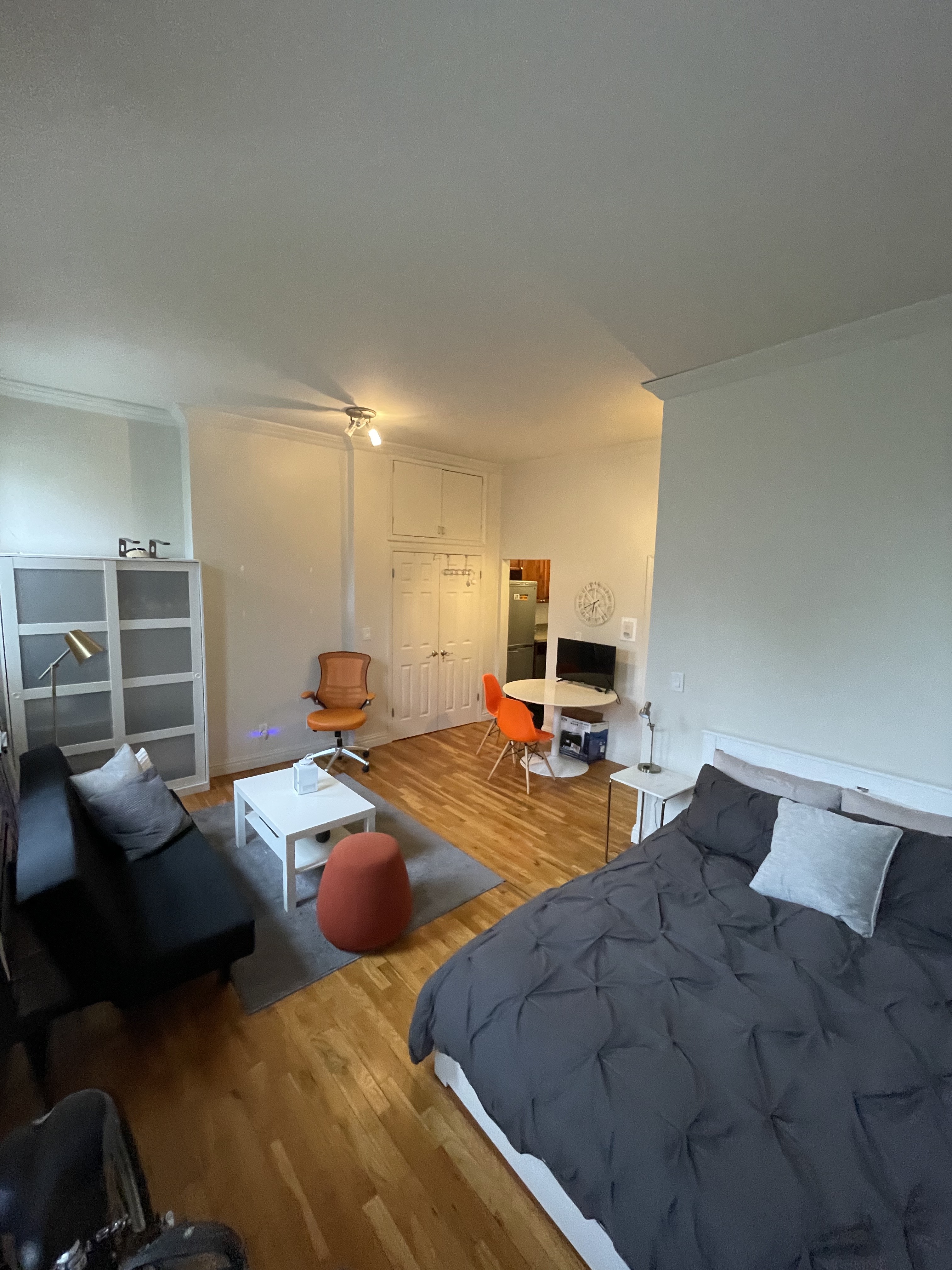 a living room with furniture and a table