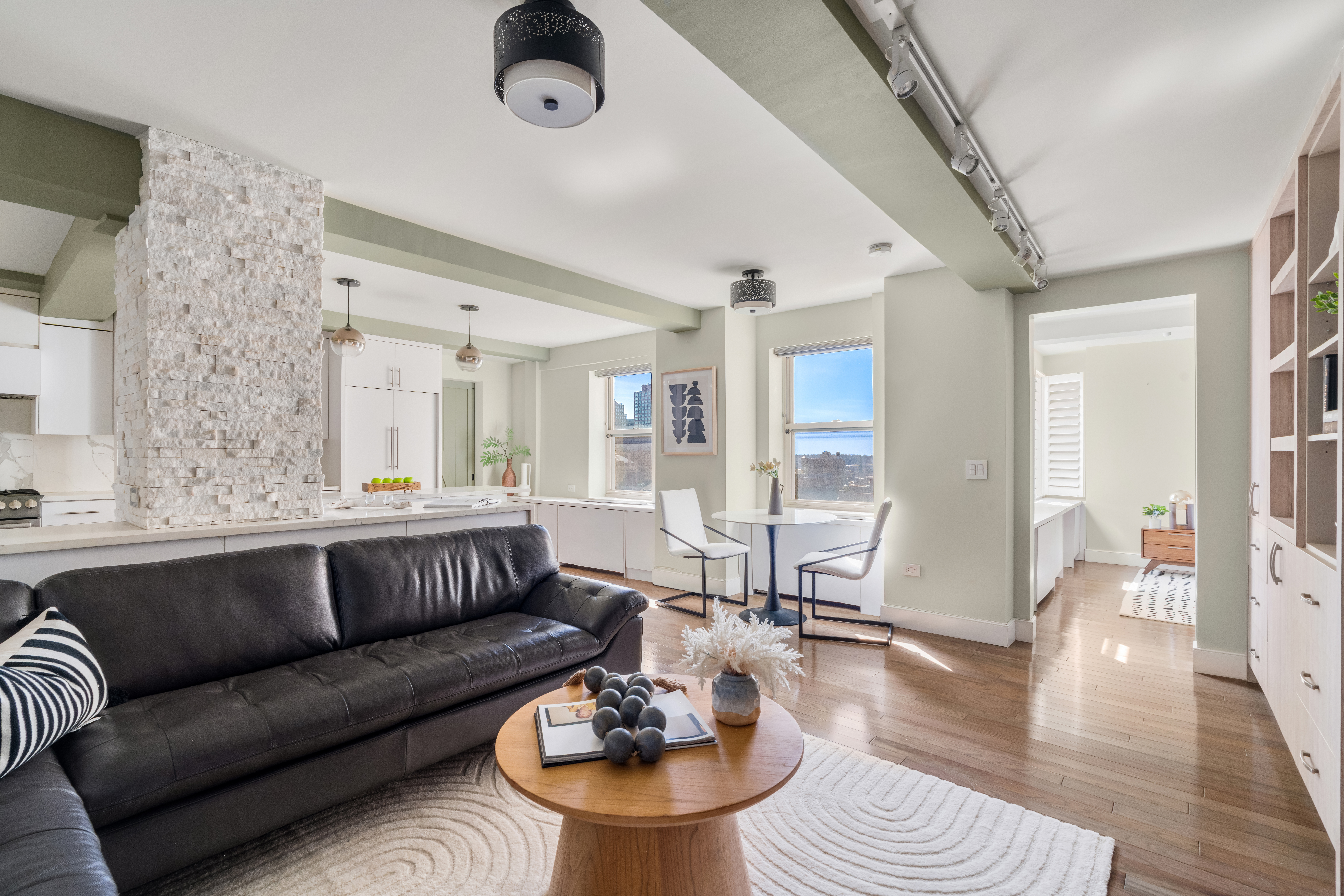 111 Hicks Street, Unit 16LM Brooklyn, NY 11201 - Photo 1 of 16 a living room with furniture and wooden floor