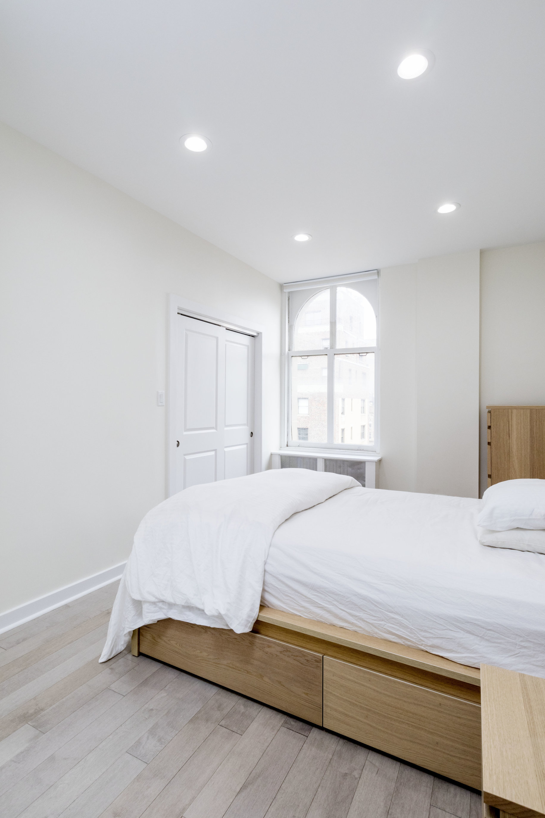 390 West End Avenue, Unit PHK Manhattan, NY 10024 - Photo 11 of 27 a bedroom with a bed and a window