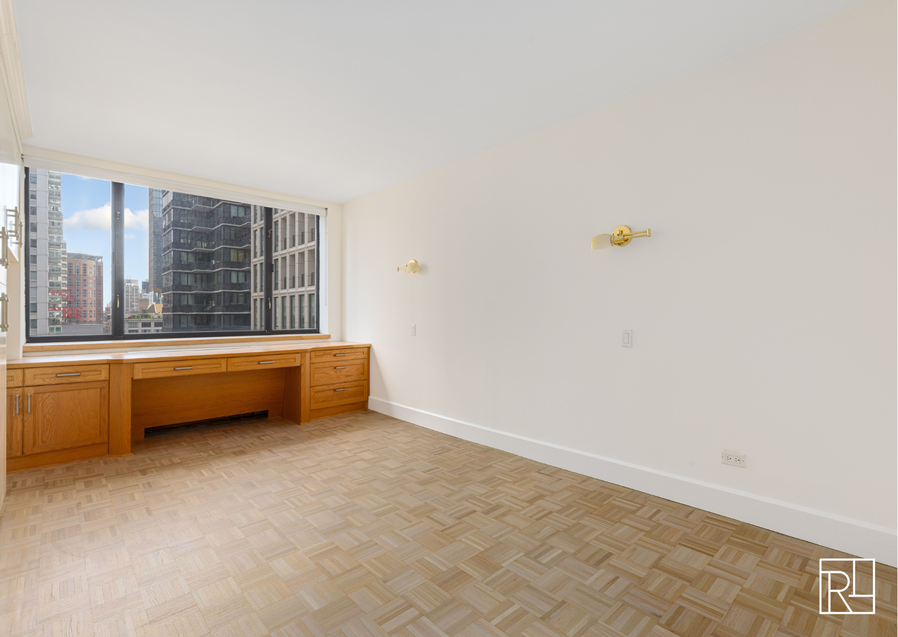 30 West 61st Street, Unit 16D Manhattan, NY 10023 - Photo 7 of 12 a view of an empty room with a window