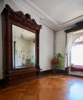 a view of sitting area in front of a window