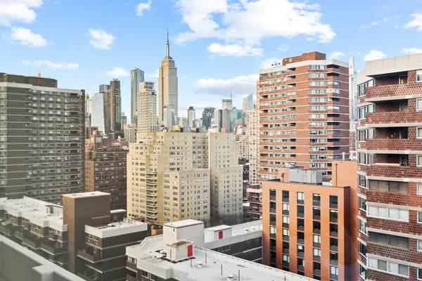 a view of a city with tall buildings