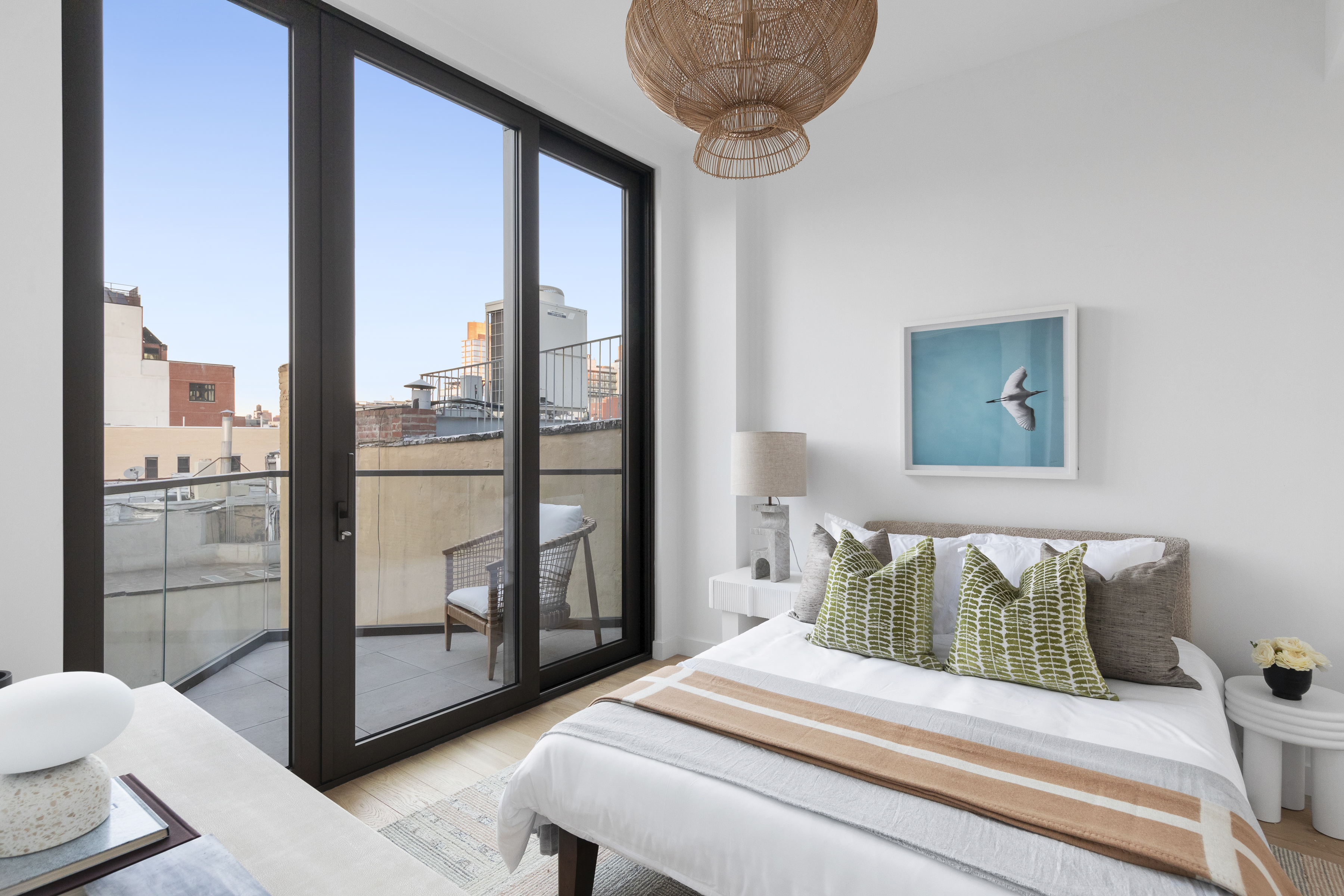 378 Broome Street, Unit PH Manhattan, NY 10013 - Photo 16 of 25 a bedroom with a bed and glass door