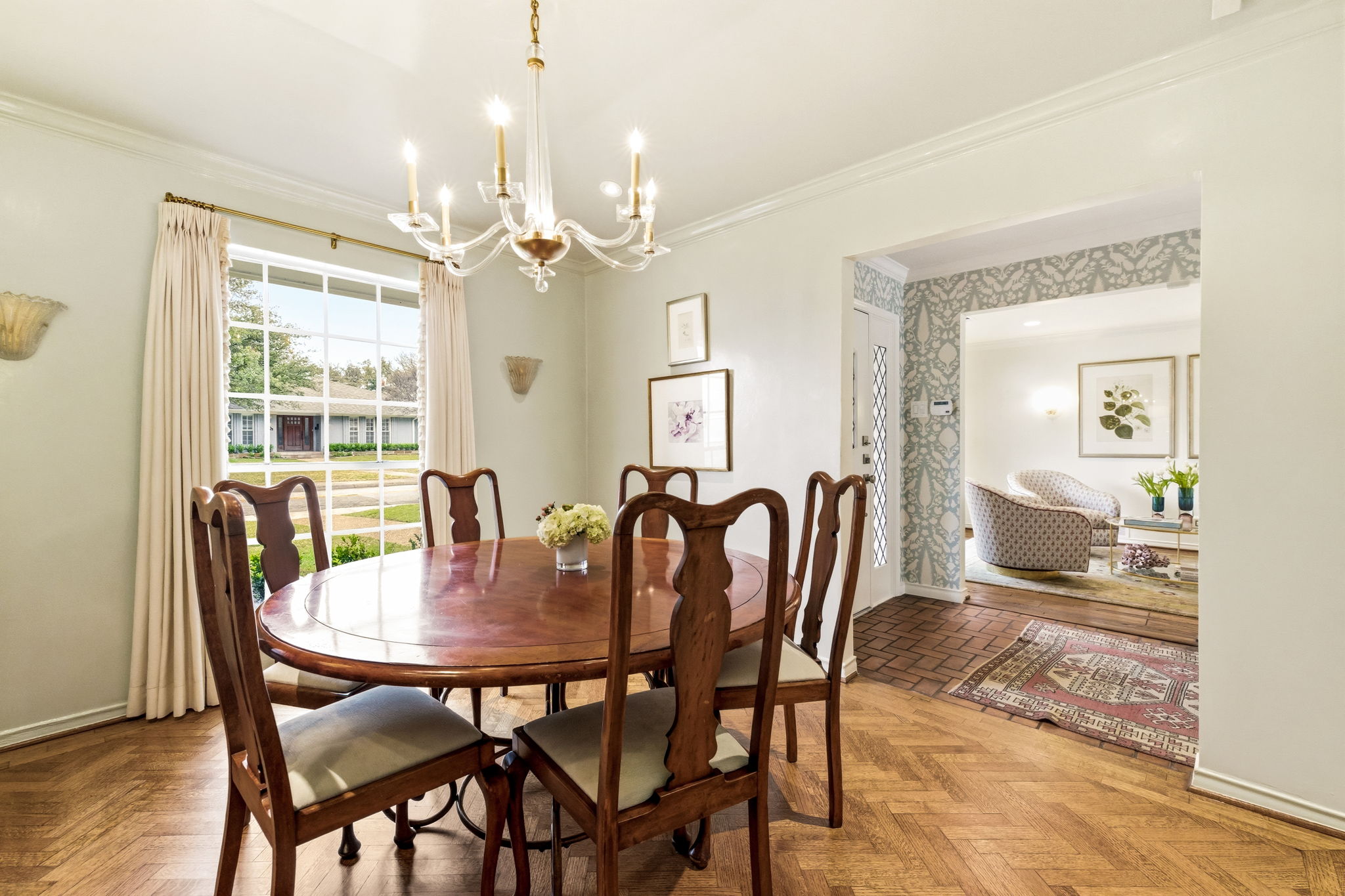 5765 Stonegate Road Dallas, TX 75209 - Photo 7 of 37 a view of a dining room with furniture window and wooden floor
