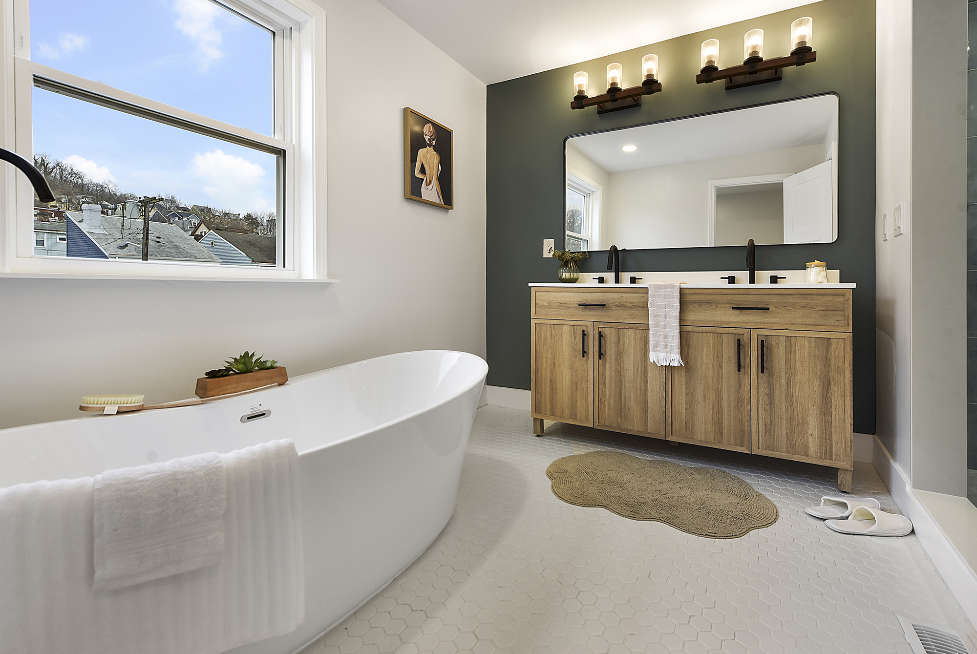 5412 Carnegie Street Pittsburgh, PA 15201 - Photo 41 of 55 a bathroom with a double vanity sink mirror and bathtub