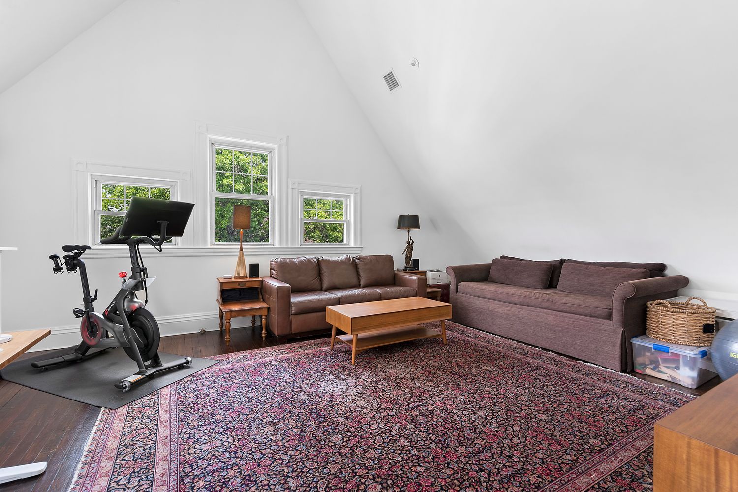 685 East 22nd Street Brooklyn, NY 11210 - Photo 27 of 43 a living room with furniture a flat screen tv and a window