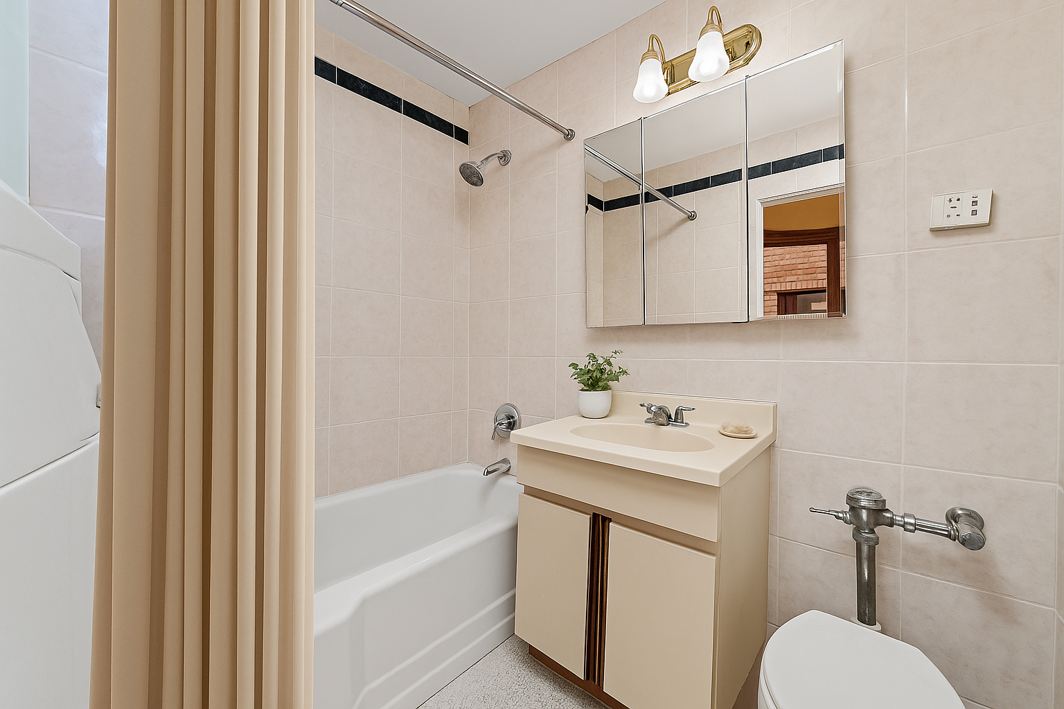 495 East 7th Street, Unit 7D Brooklyn, NY 11218 - Photo 7 of 10 a bathroom with a sink toilet and shower