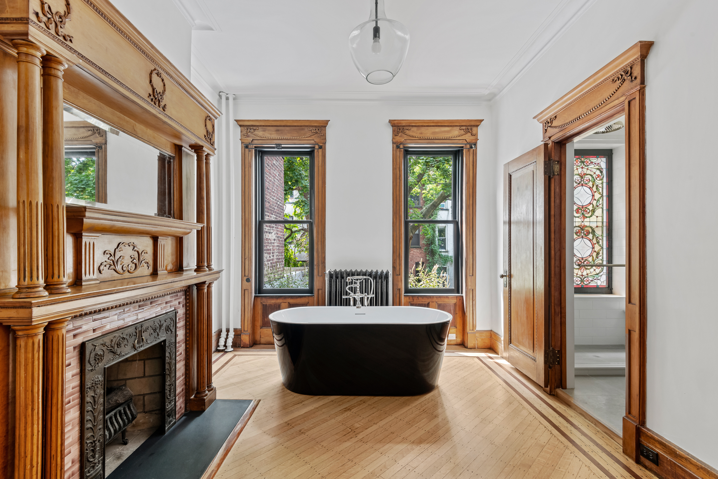 616 2nd Street Brooklyn, NY 11215 - Photo 12 of 19 a living room with furniture and a fireplace