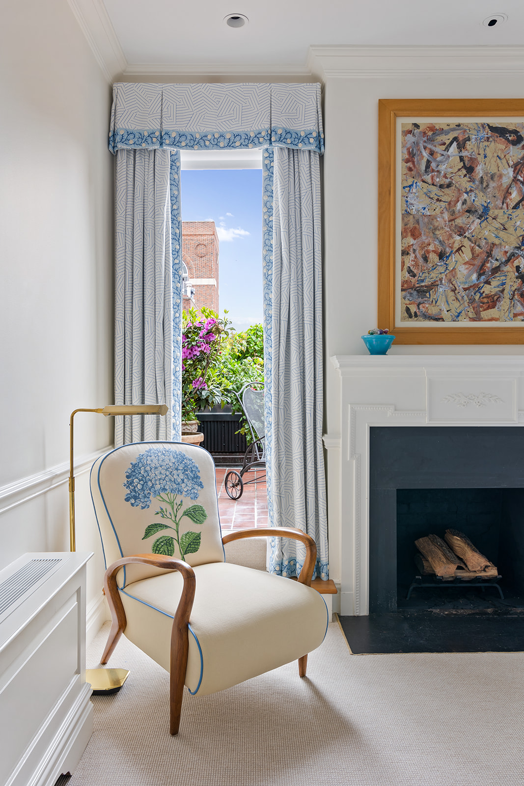 164 East 72nd Street, Unit PHC Manhattan, NY 10021 - Photo 6 of 17 a living room with furniture a fireplace and a painting