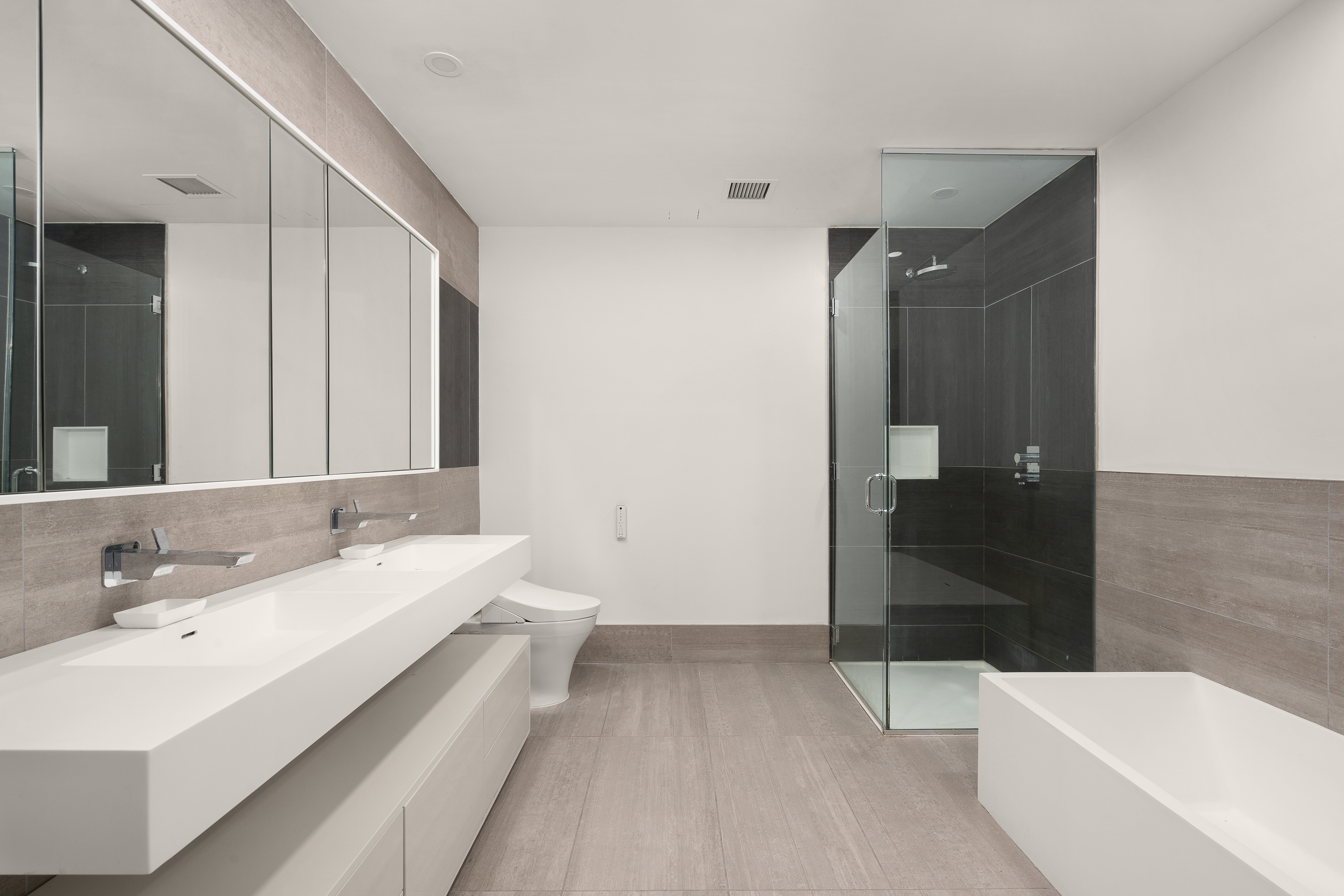 545 West 48th Street, Unit 308S Manhattan, NY 10036 - Photo 5 of 8 a bathroom with a bathtub and a sink