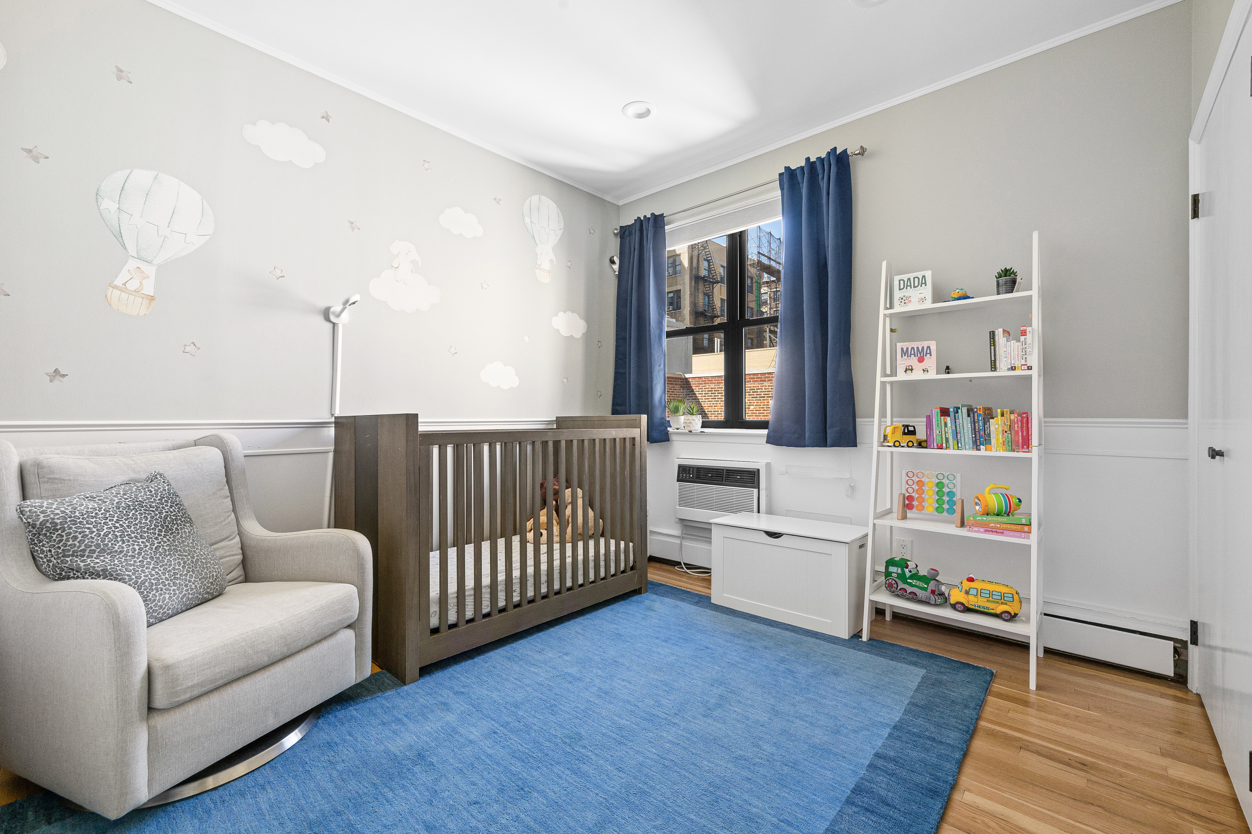 315 West 99th Street, Unit PHA Manhattan, NY 10025 - Photo 10 of 17 a room with furniture and a wooden floor
