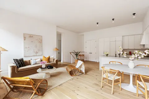 a view of a dining room with furniture
