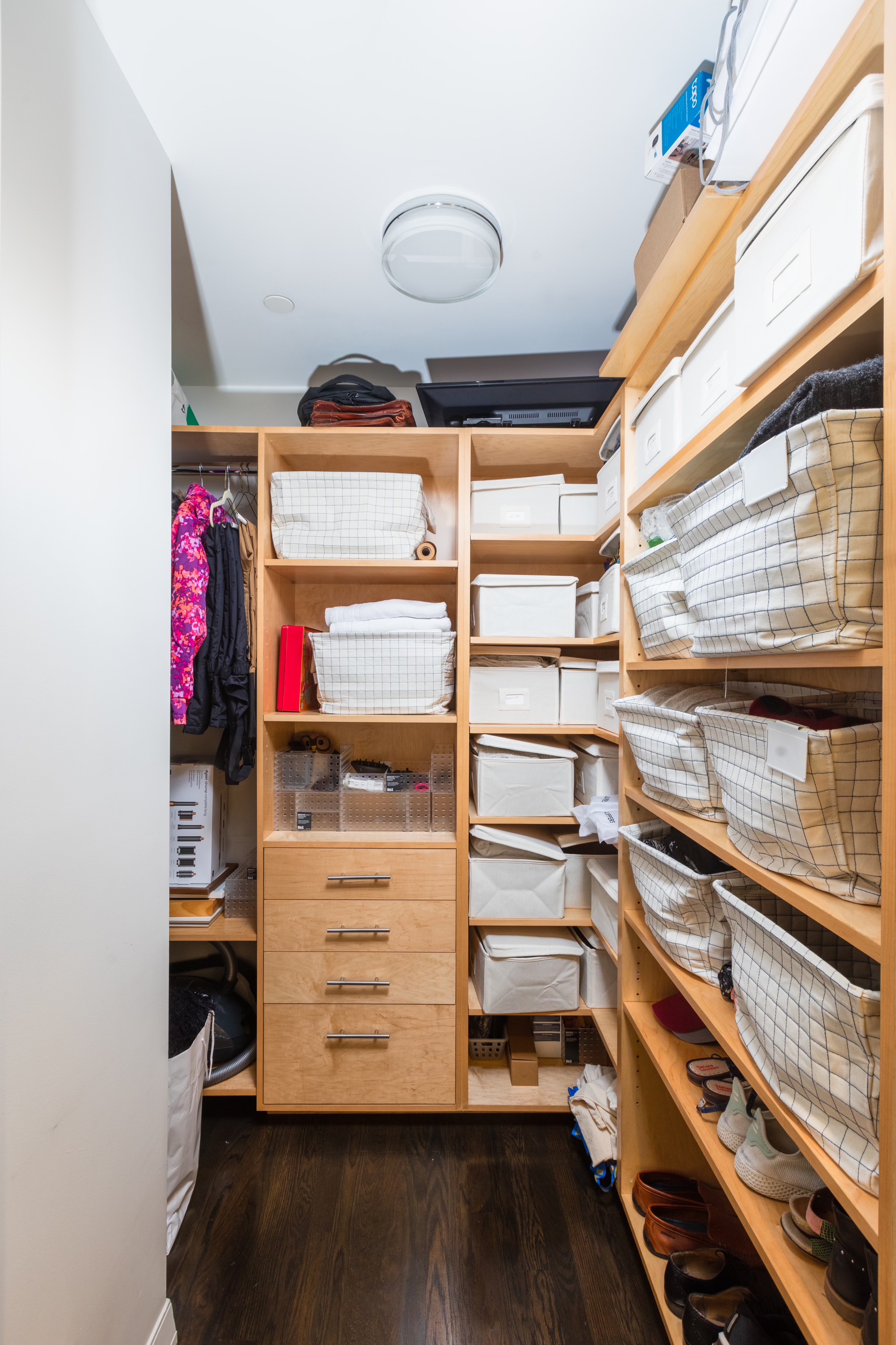 422 West 20th Street, Unit 3G Manhattan, NY 10011 - Photo 10 of 15 a view of walk in closet with clothes and shoes