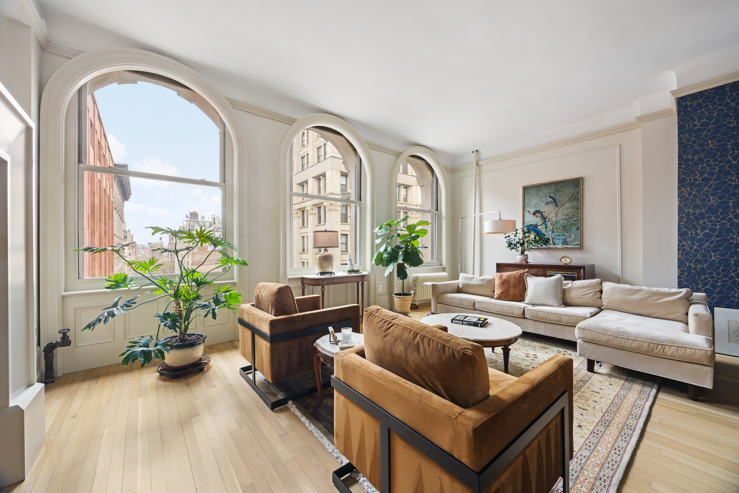 714 Broadway, Unit 8 Manhattan, NY 10003 - Photo 3 of 23 a living room with furniture and a large window