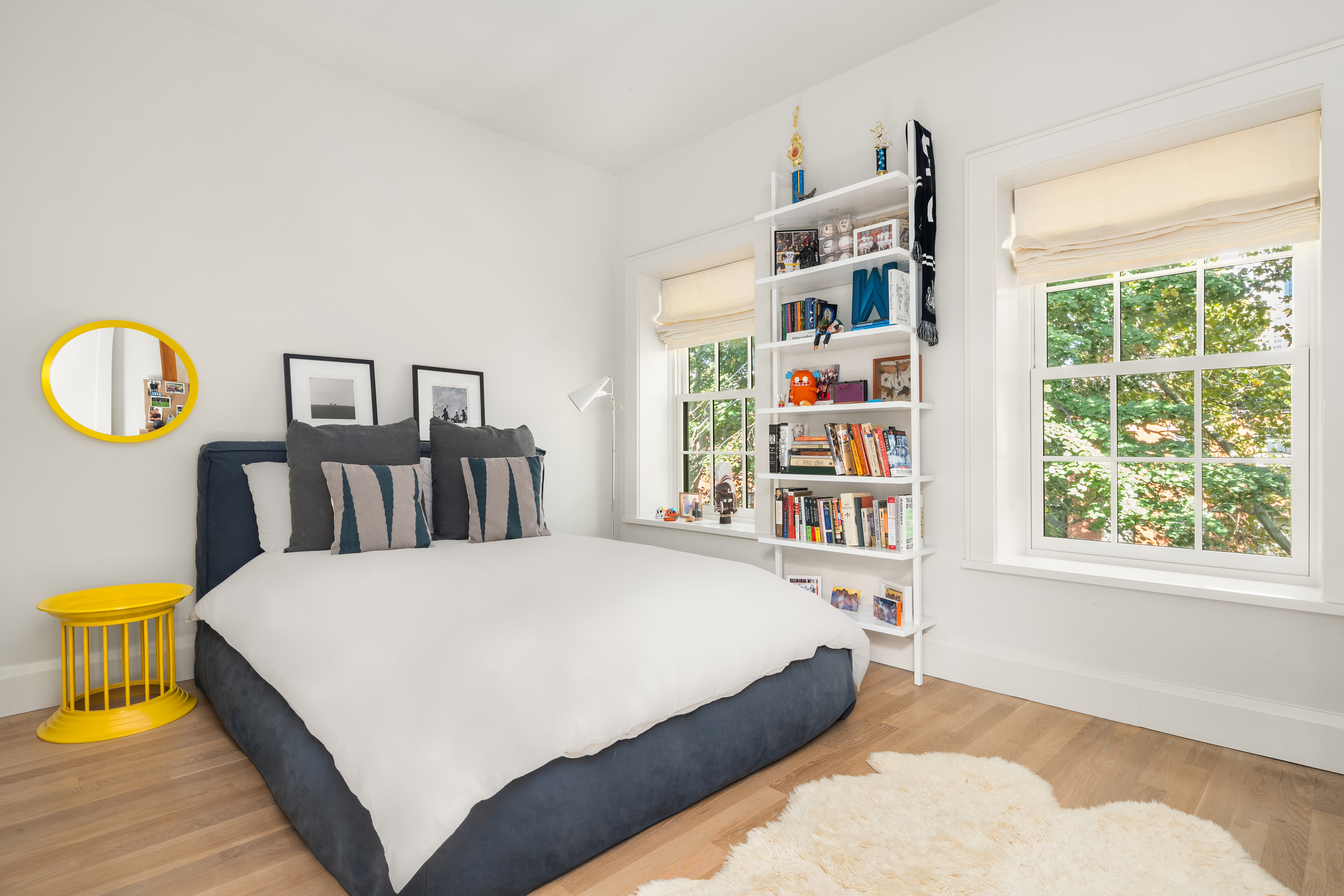 168 Bergen Street Brooklyn, NY 11217 - Photo 17 of 25 a bedroom with a bed and a large window
