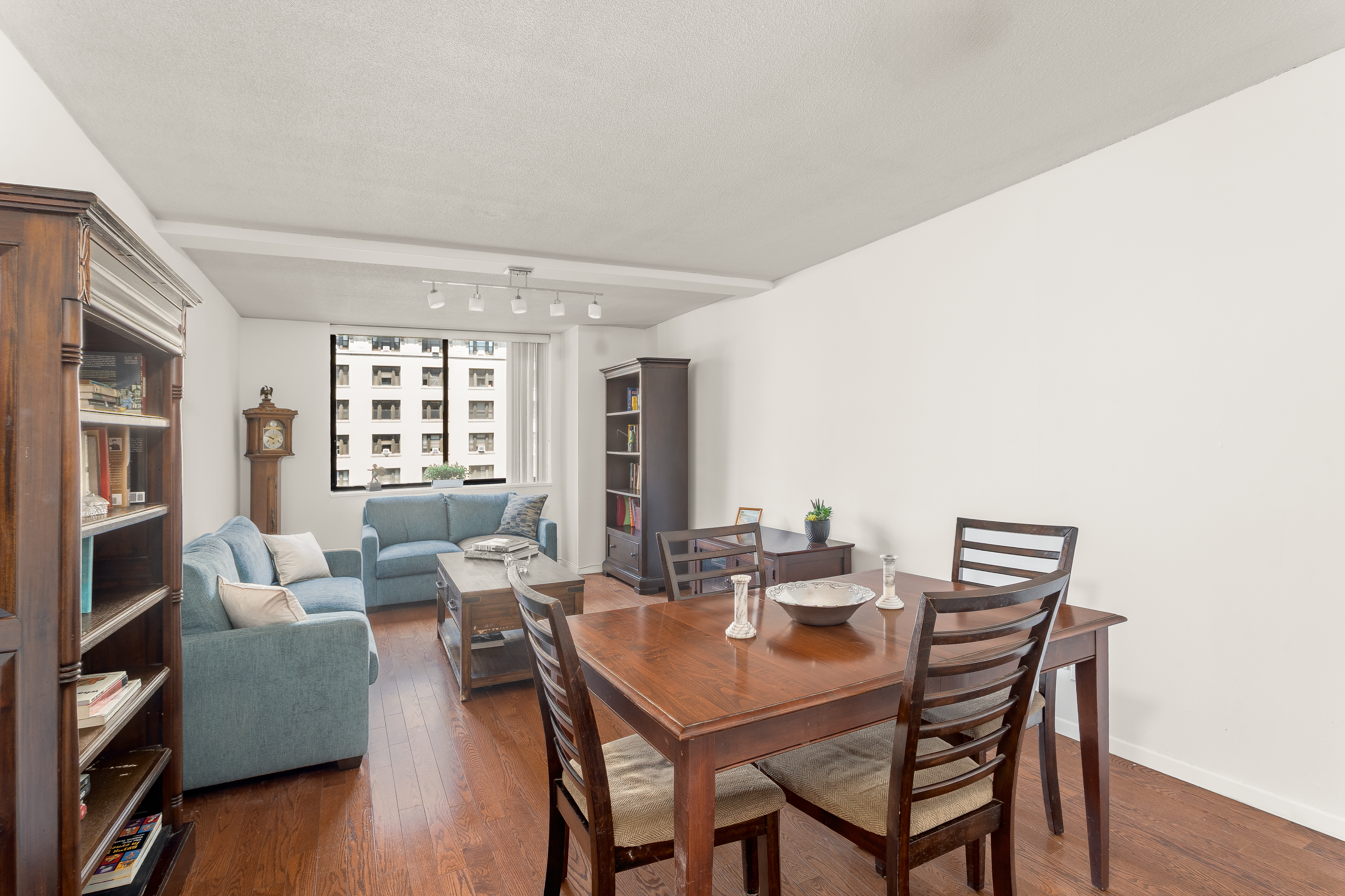 275 West 96th Street, Unit 12B Manhattan, NY 10025 - Photo 1 of 28 a view of a dining room with furniture and wooden floor