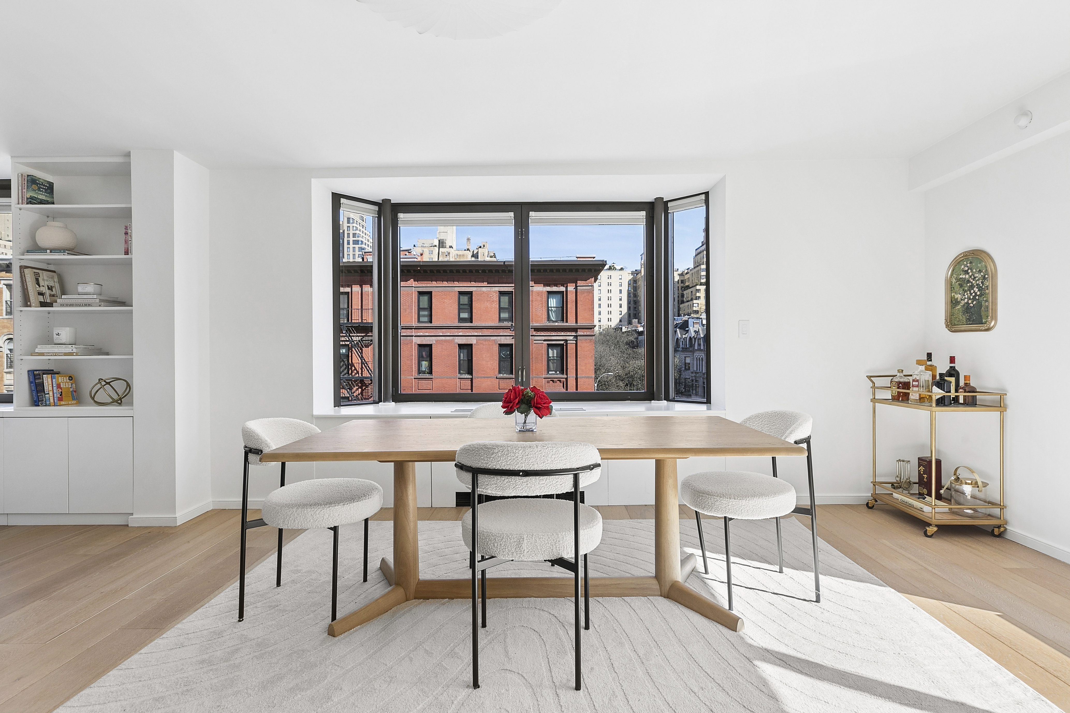 101 West 87th Street, Unit 505 Manhattan, NY 10024 - Photo 6 of 15 a table and chairs in a room