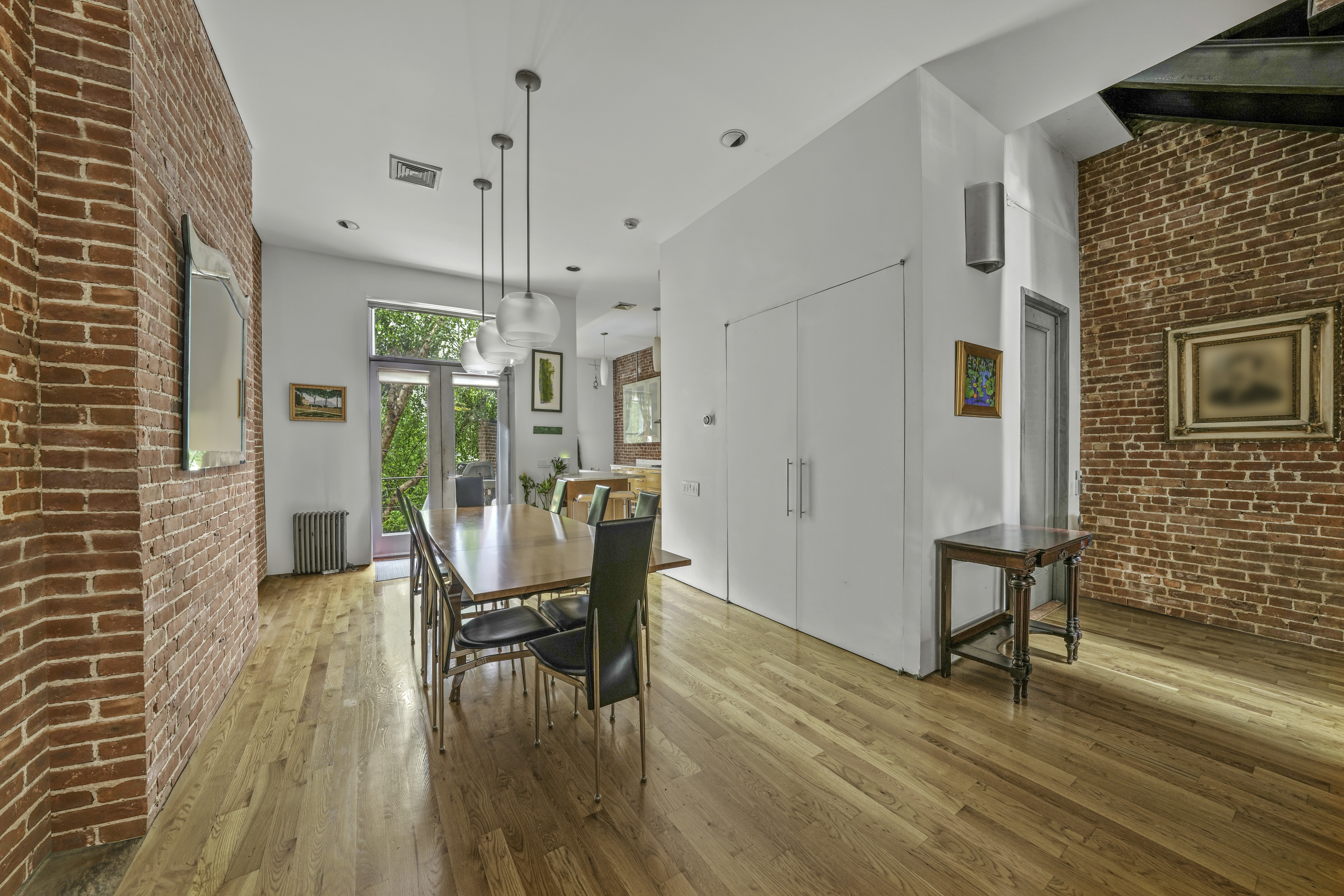 109 West 118th Street Manhattan, NY 10026 - Photo 5 of 31 a view of a livingroom with furniture and a ceiling fan