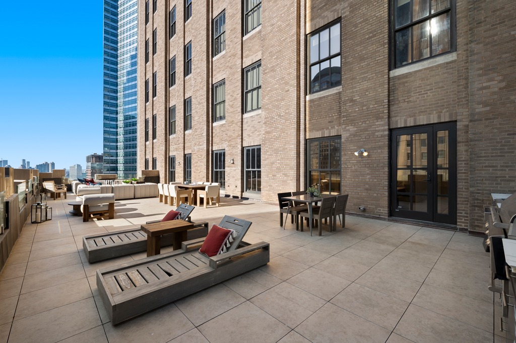 100 Barclay Street, Unit 21AD Manhattan, NY 10007 - Photo 25 of 40 a view of a terrace with seating space