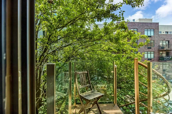 a view of a chairs in a balcony