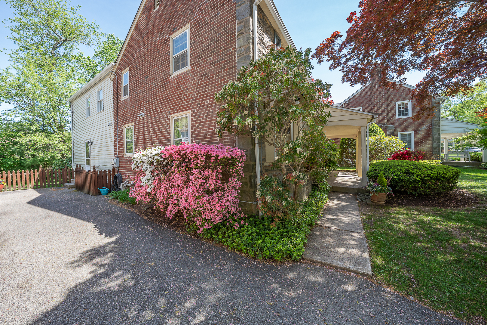 519 Mercer Road Merion Station, PA 19066 - Photo 10 of 58 a front view of a house with garden