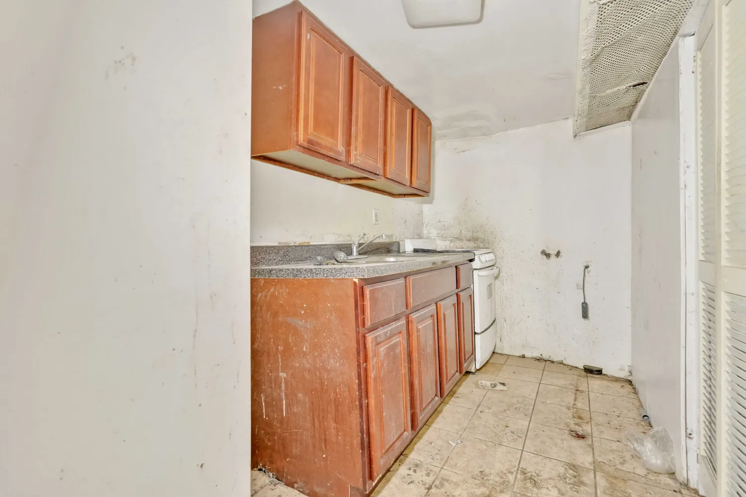 a bedroom with bed and window