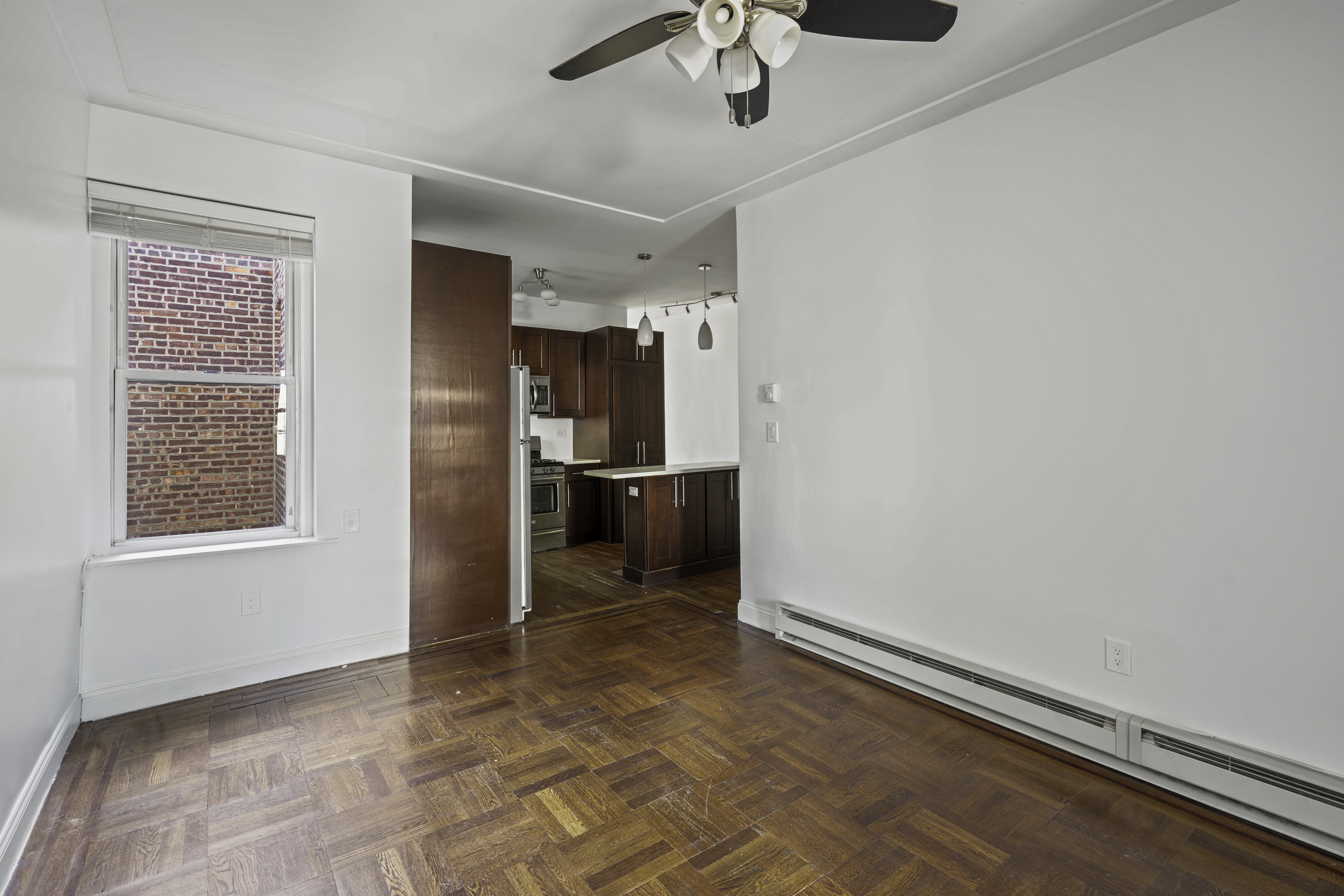 514 86th Street, Unit 4 Brooklyn, NY 11209 - Photo 8 of 19 a view of a kitchen with a sink and cabinet
