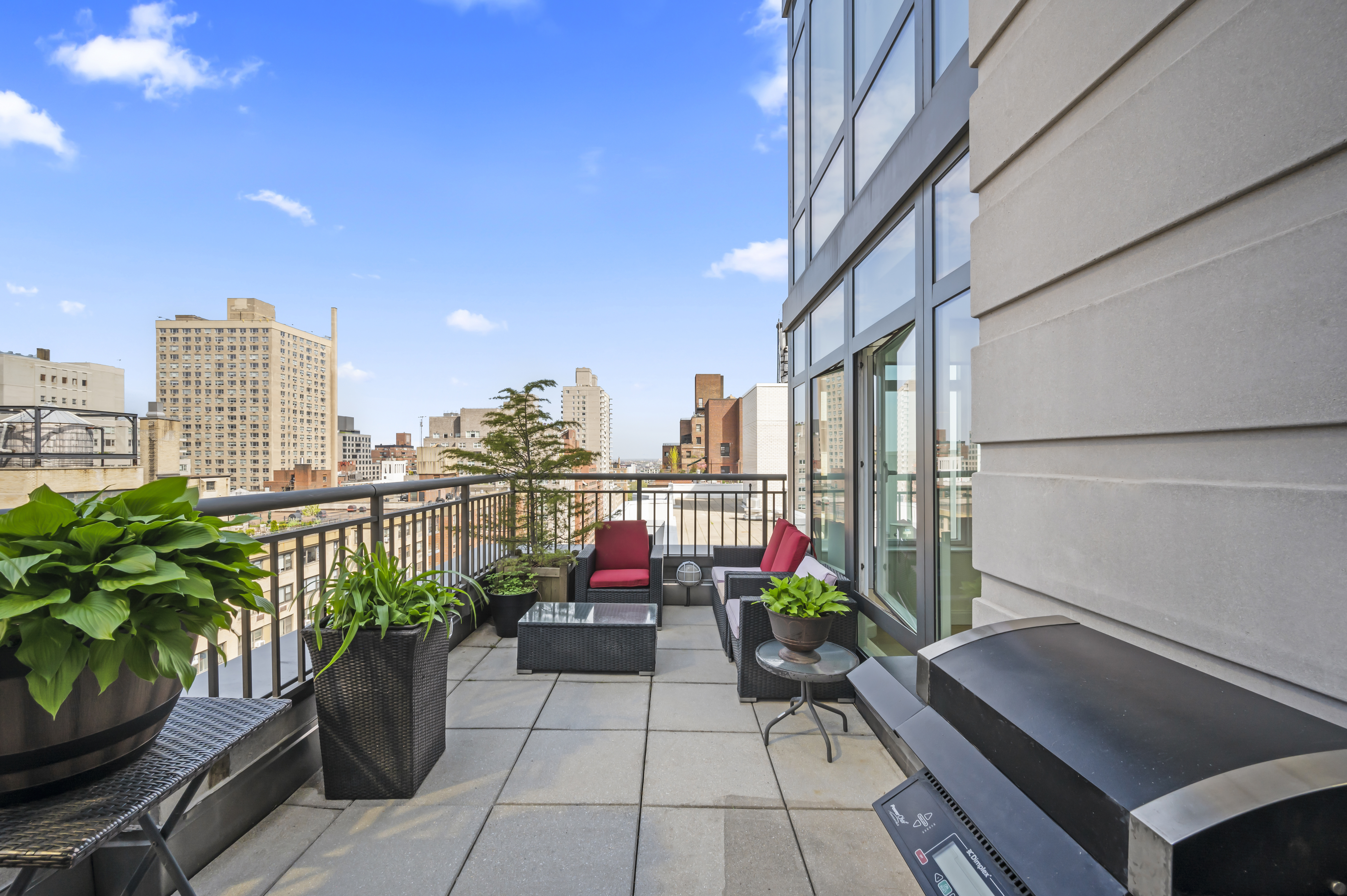 408 East 79th Street, Unit 16B Manhattan, NY 10075 - Photo 5 of 16 a view of a potted flower in the corridor