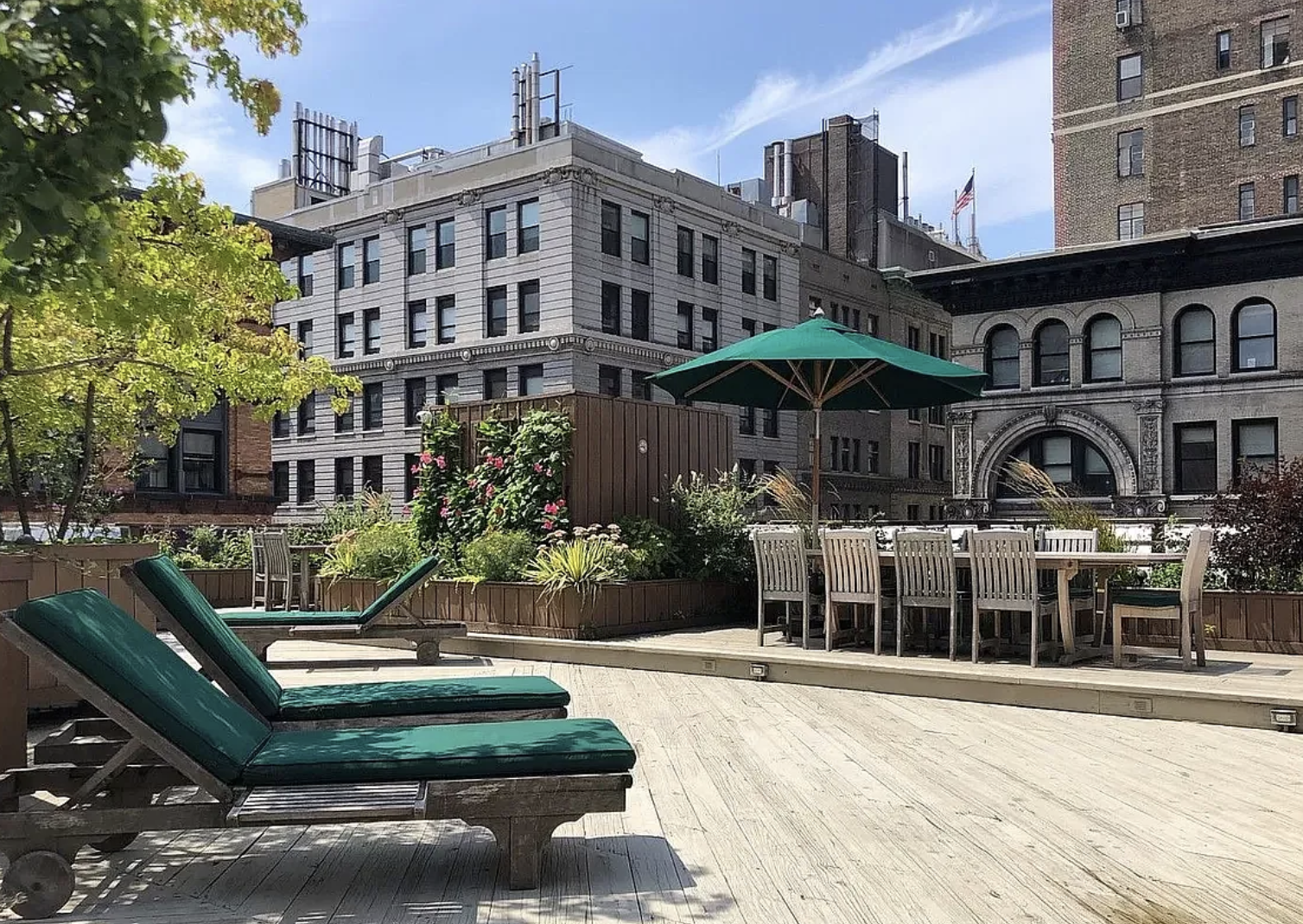 23 Waverly Place, Unit 5U Manhattan, NY 10003 - Photo 11 of 13 a front view of a building with garden