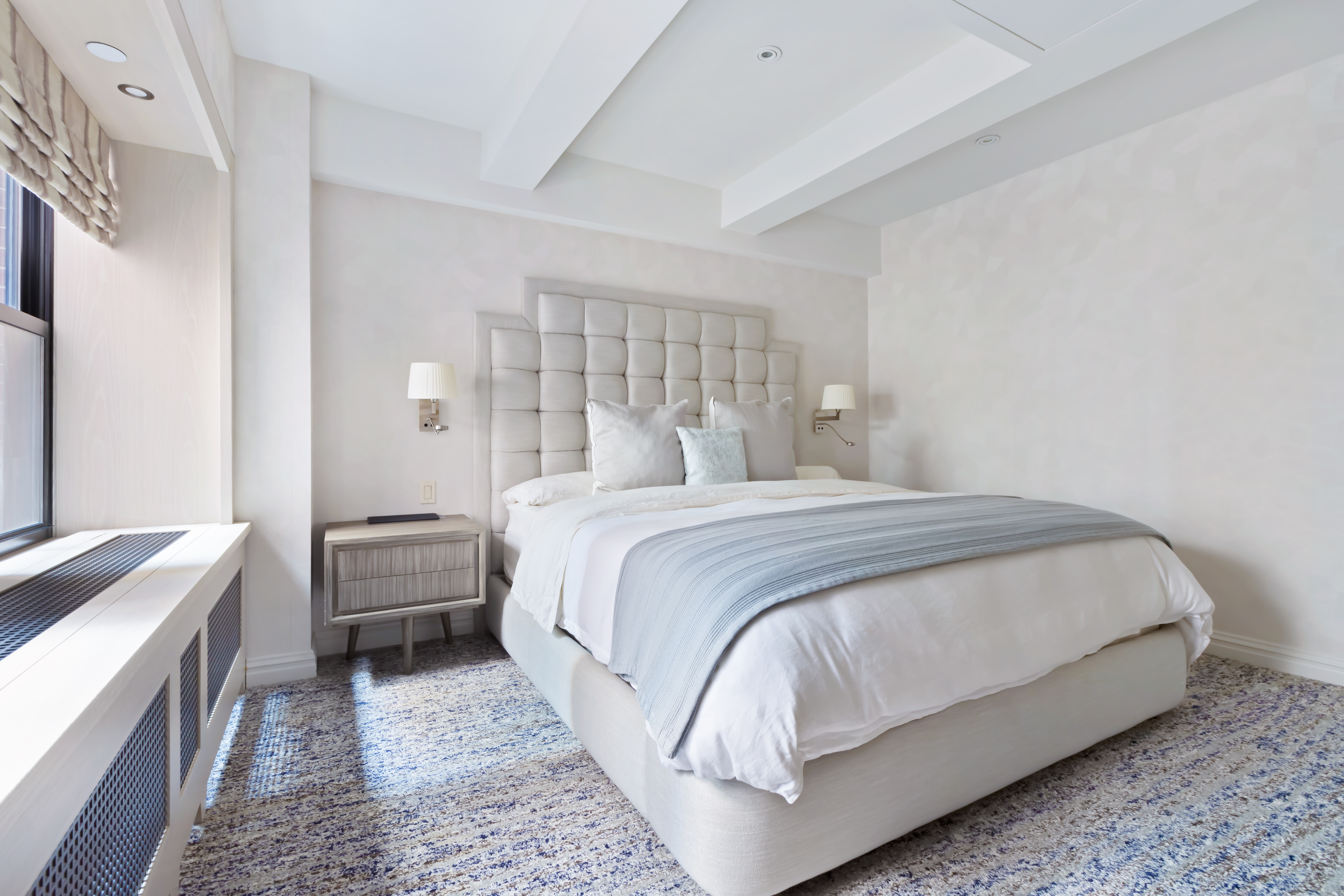 161 Duane Street, Unit 4B Manhattan, NY 10013 - Photo 6 of 12 a bedroom with a bed and a couch