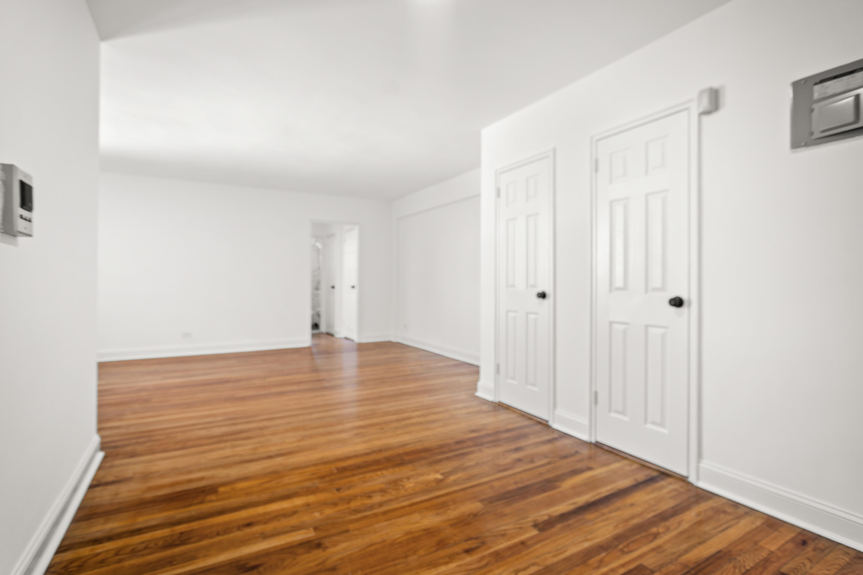 5650 Netherland Avenue, Unit 6C Bronx, NY 10471 - Photo 6 of 16 a view of empty room with wooden floor