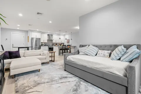 a living room with furniture and a couch