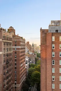 a view of a swimming pool with an outdoor seating