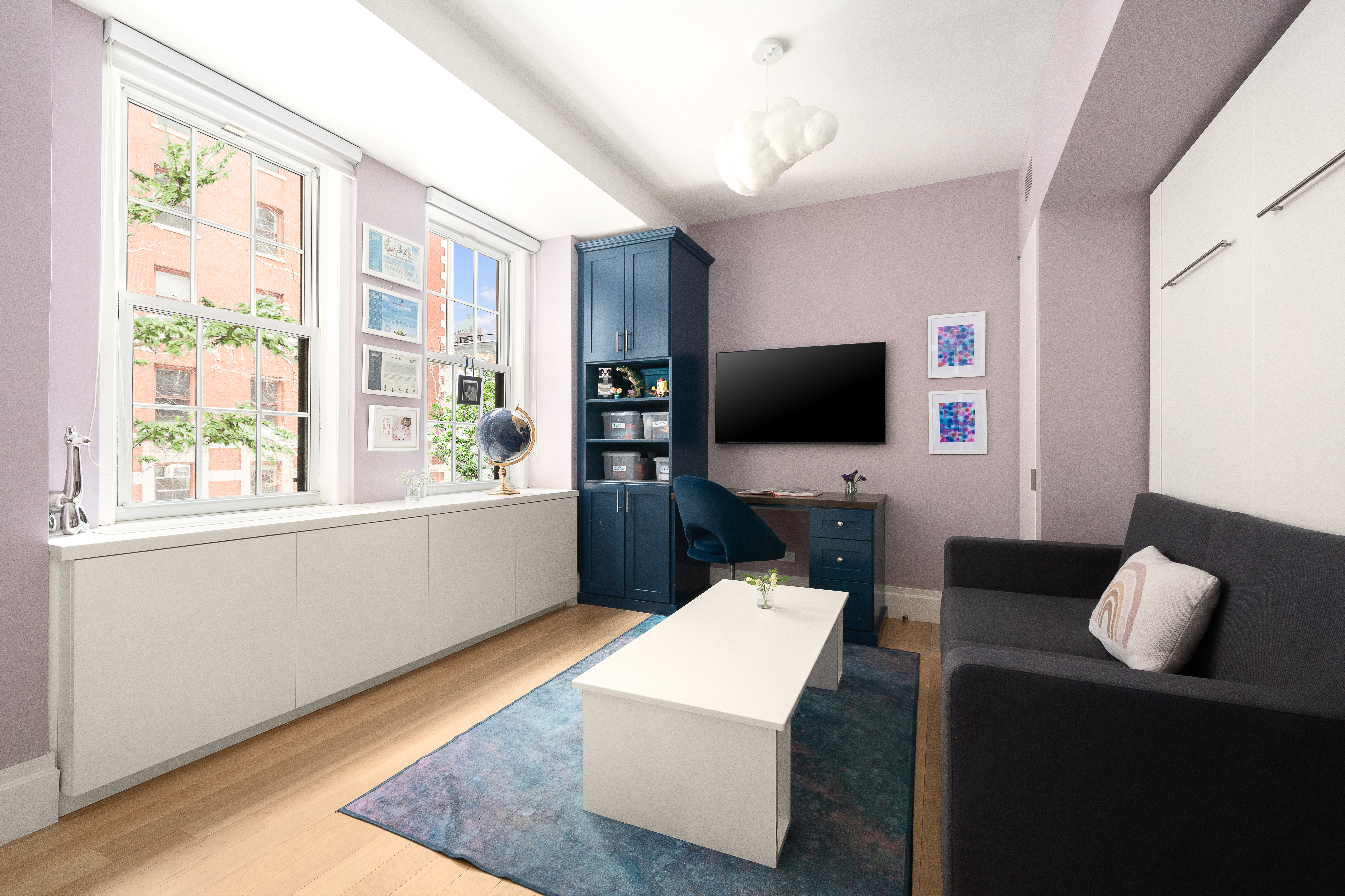 160 Henry Street, Unit 3C Brooklyn, NY 11201 - Photo 13 of 18 a living room with furniture and a flat screen tv