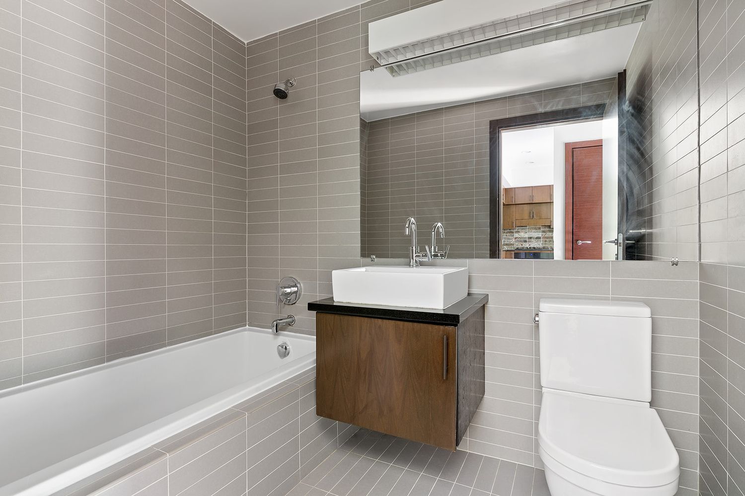 150 Myrtle Avenue, Unit 805 Brooklyn, NY 11201 - Photo 8 of 26 a bathroom with a sink a toilet and bathtub