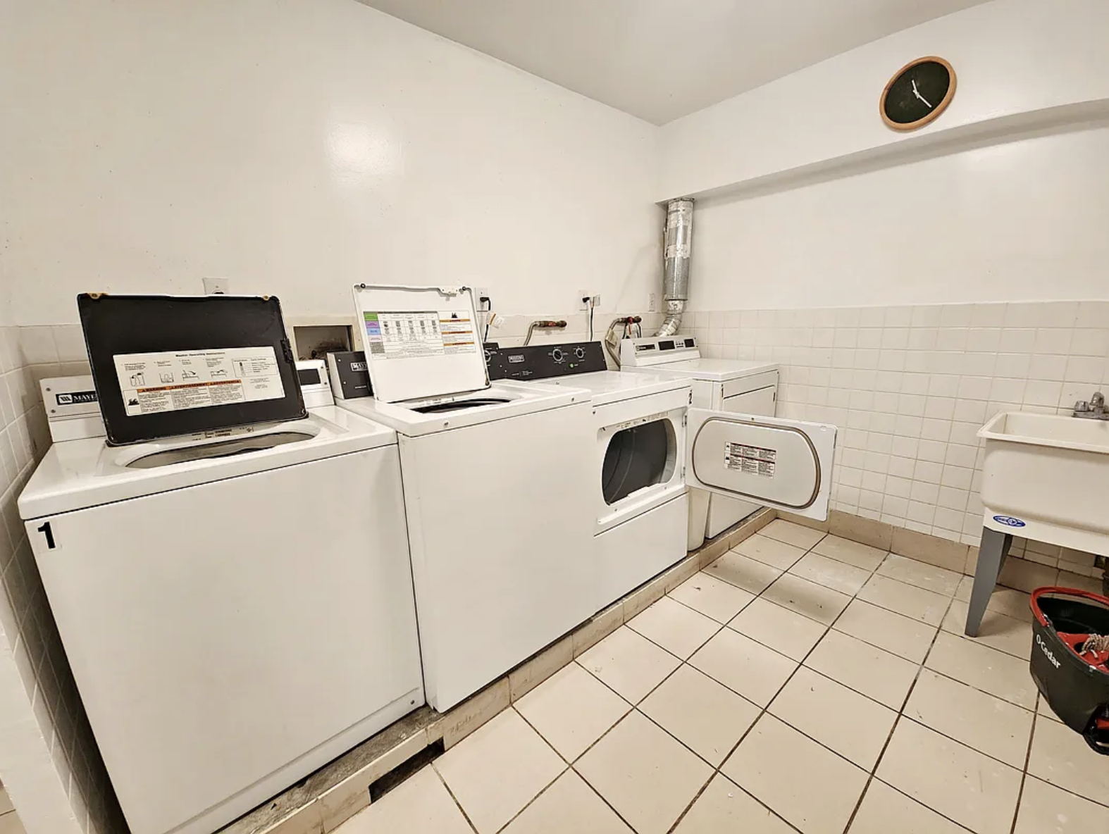 190 Meserole Avenue, Unit 2N Brooklyn, NY 11222 - Photo 9 of 10 a utility room with dryer and washer