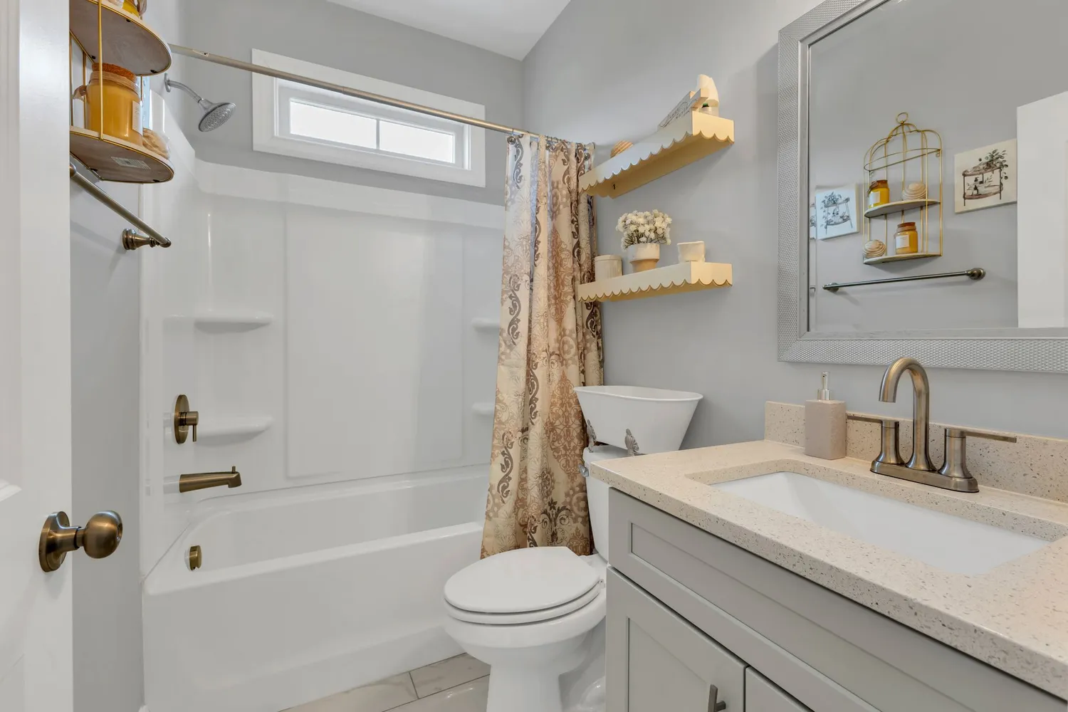 a bathroom with a sink a toilet and a bathtub