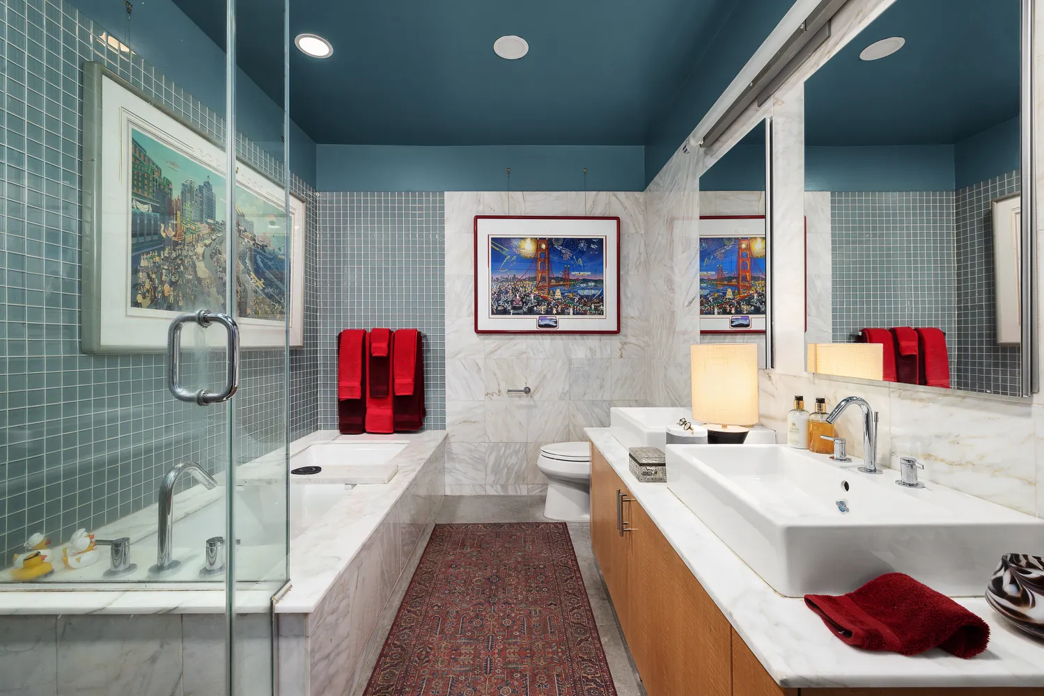 a bedroom with a bed couch and a window