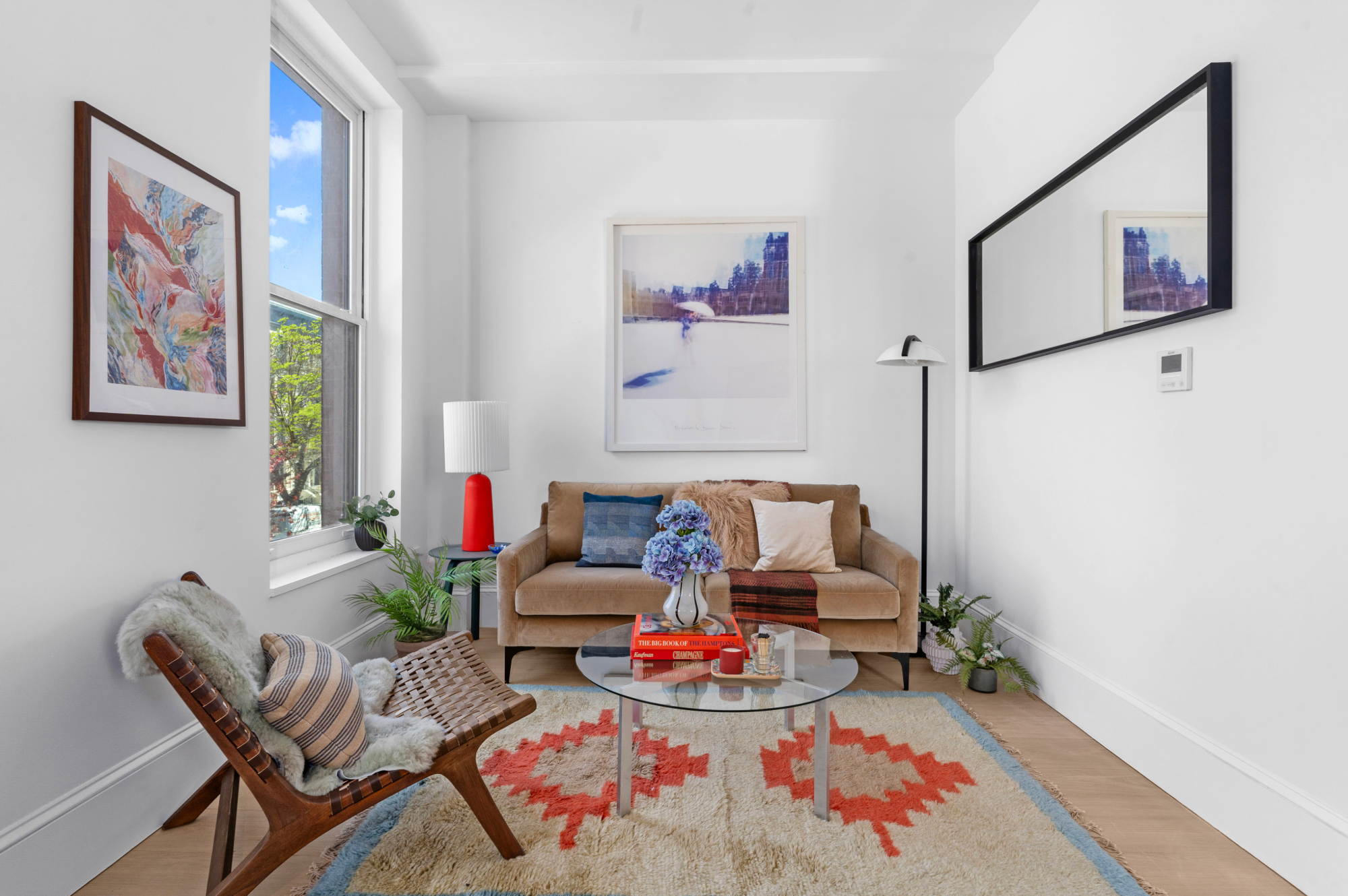 1370 Dean Street, Unit B Brooklyn, NY 11216 - Photo 2 of 8 a living room with furniture and painting on the wall