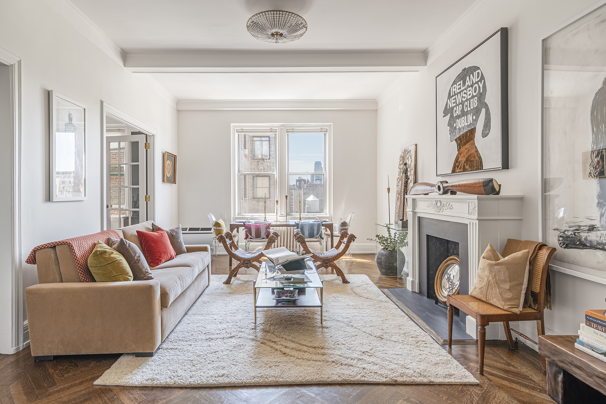 302 West 86th Street, Unit 11C Manhattan, NY 10024 - Photo 2 of 16 a living room with furniture fireplace and window