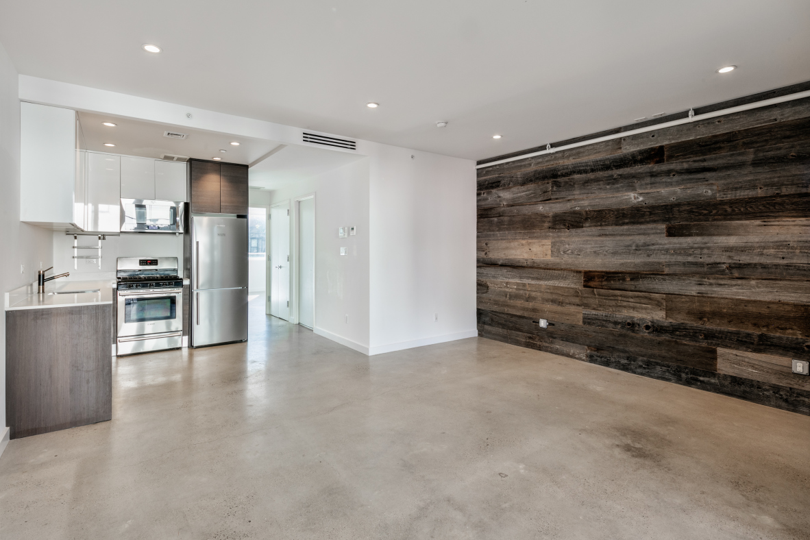 834 Sterling Place, Unit 203 Brooklyn, NY 11216 - Photo 2 of 12 a view of kitchen with refrigerator and wooden floor