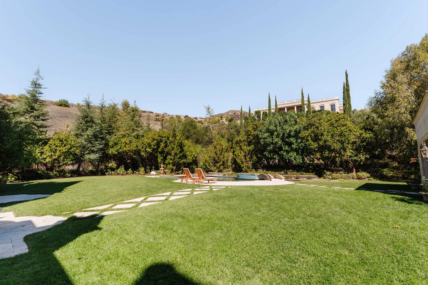 a view of a playground with basketball court
