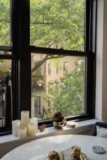a living room with large windows