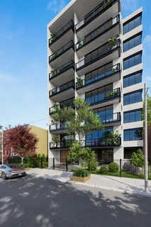 a view of a building with a street